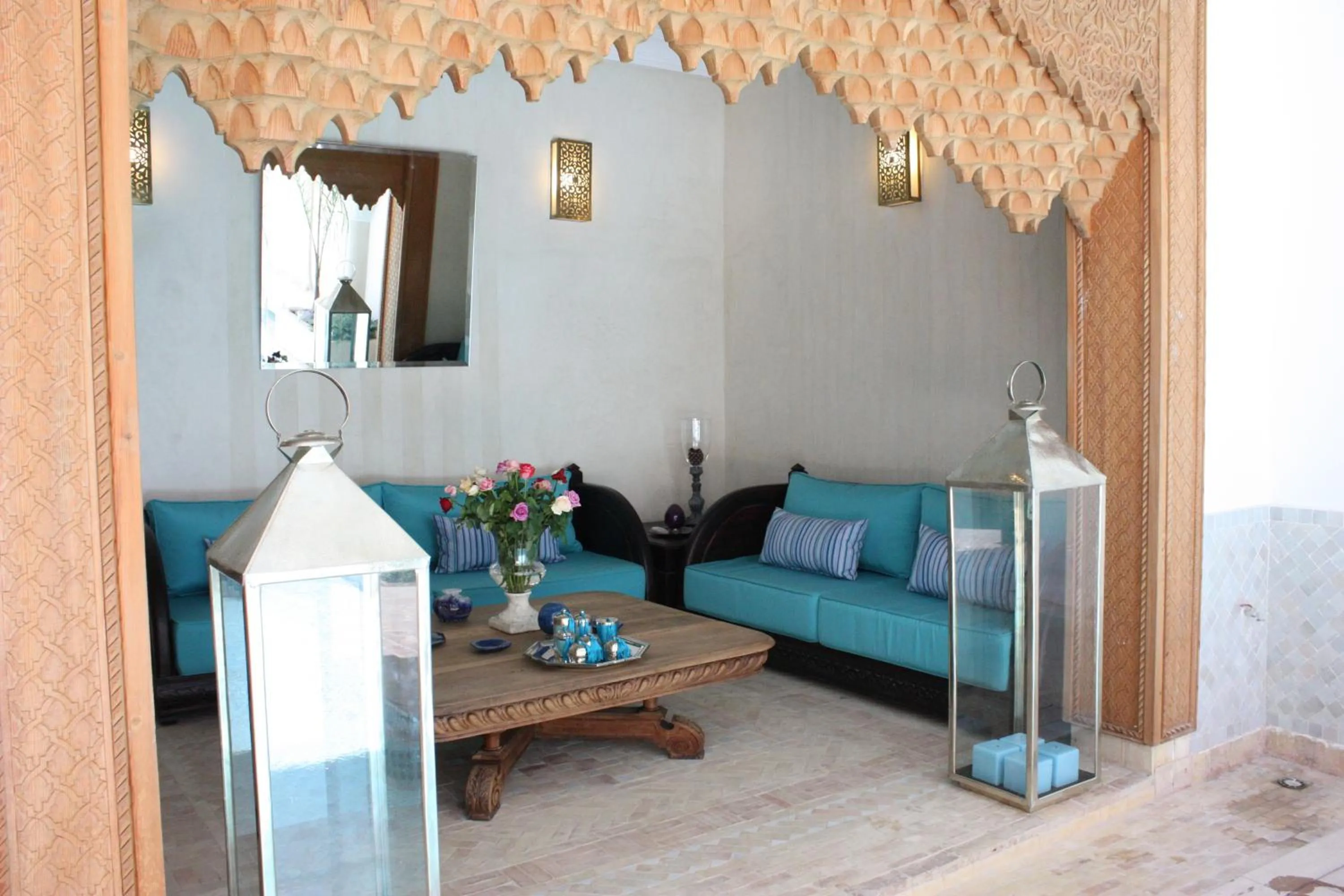 Communal lounge/ TV room in Riad La Villa Marrakech