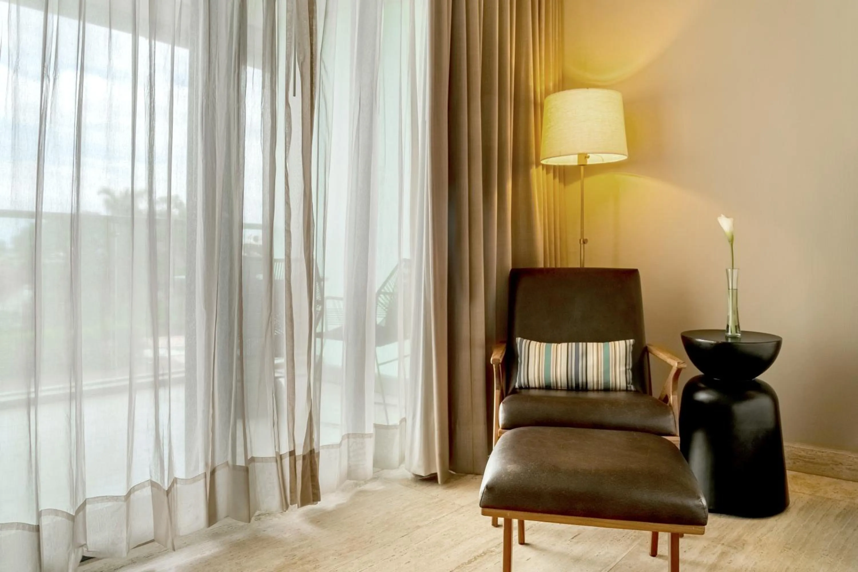 Seating area in Thompson Playa Del Carmen Main House, by Hyatt