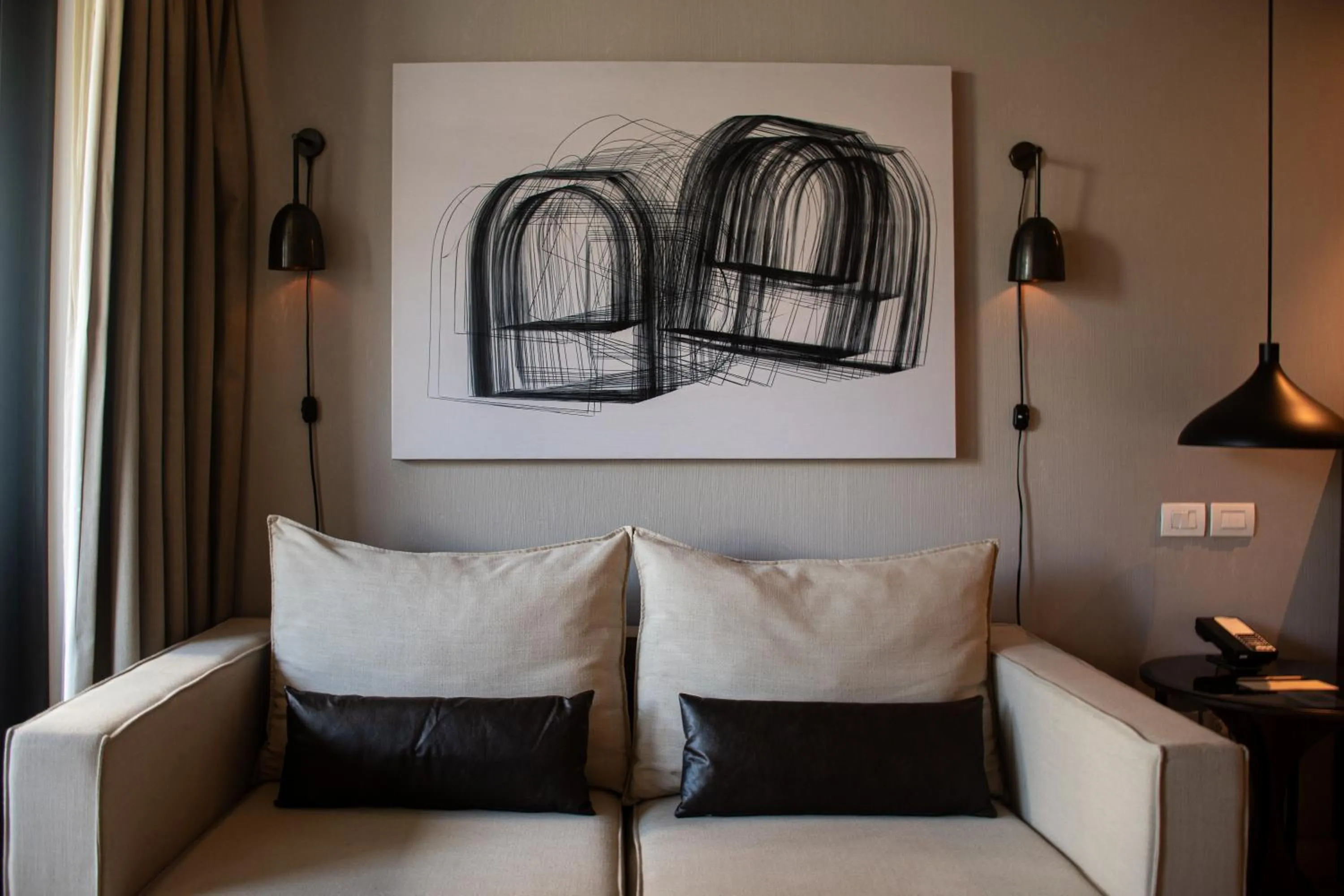 Living room in Thompson Playa Del Carmen Main House, by Hyatt