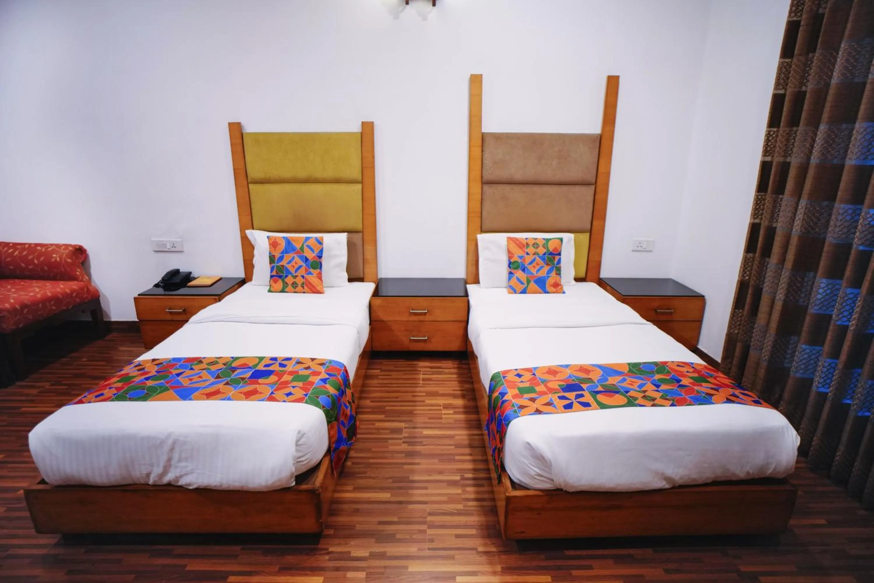 Bed in Hari's Court Inns & Hotels