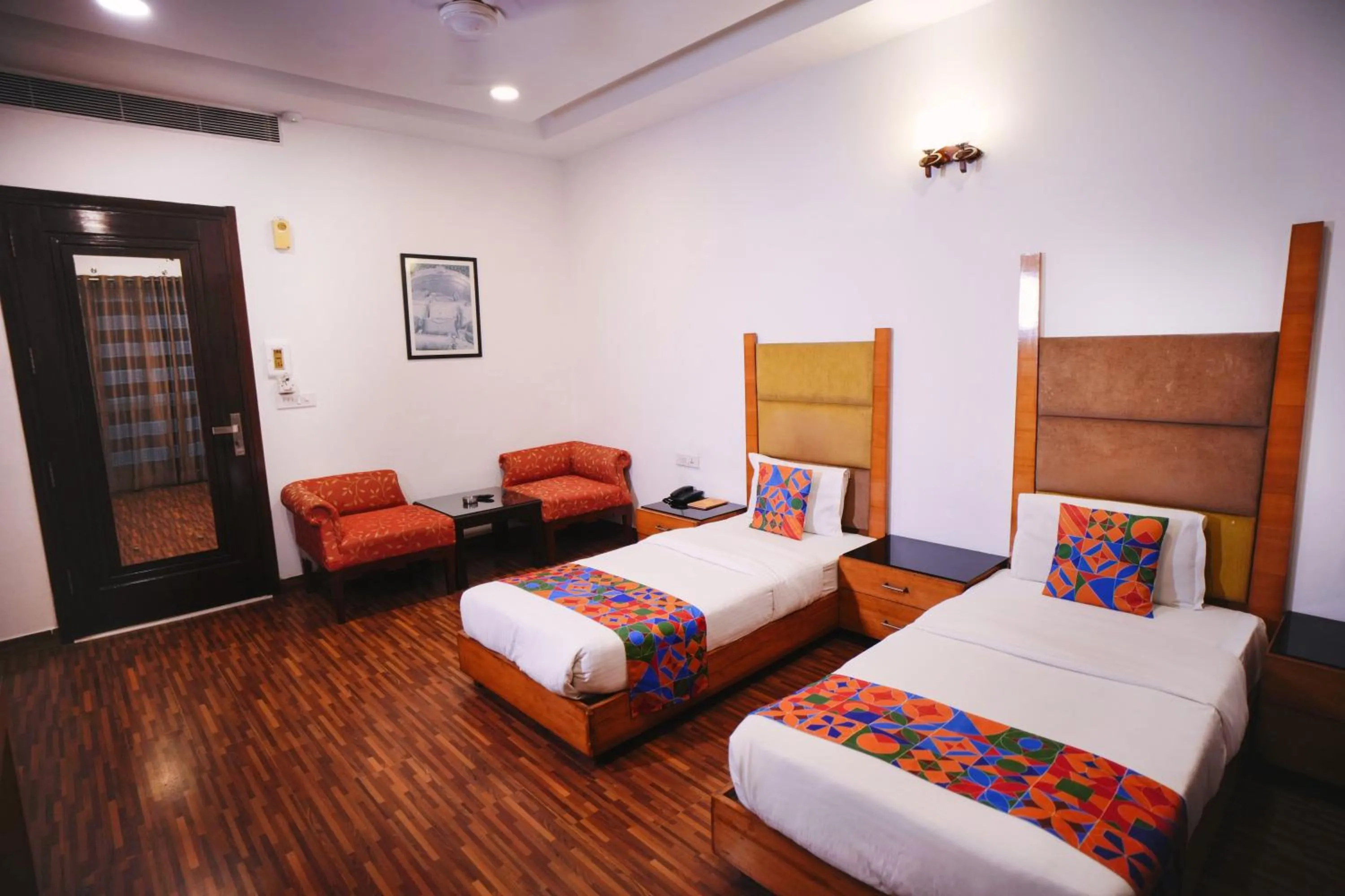 Bed in Hari's Court Inns & Hotels