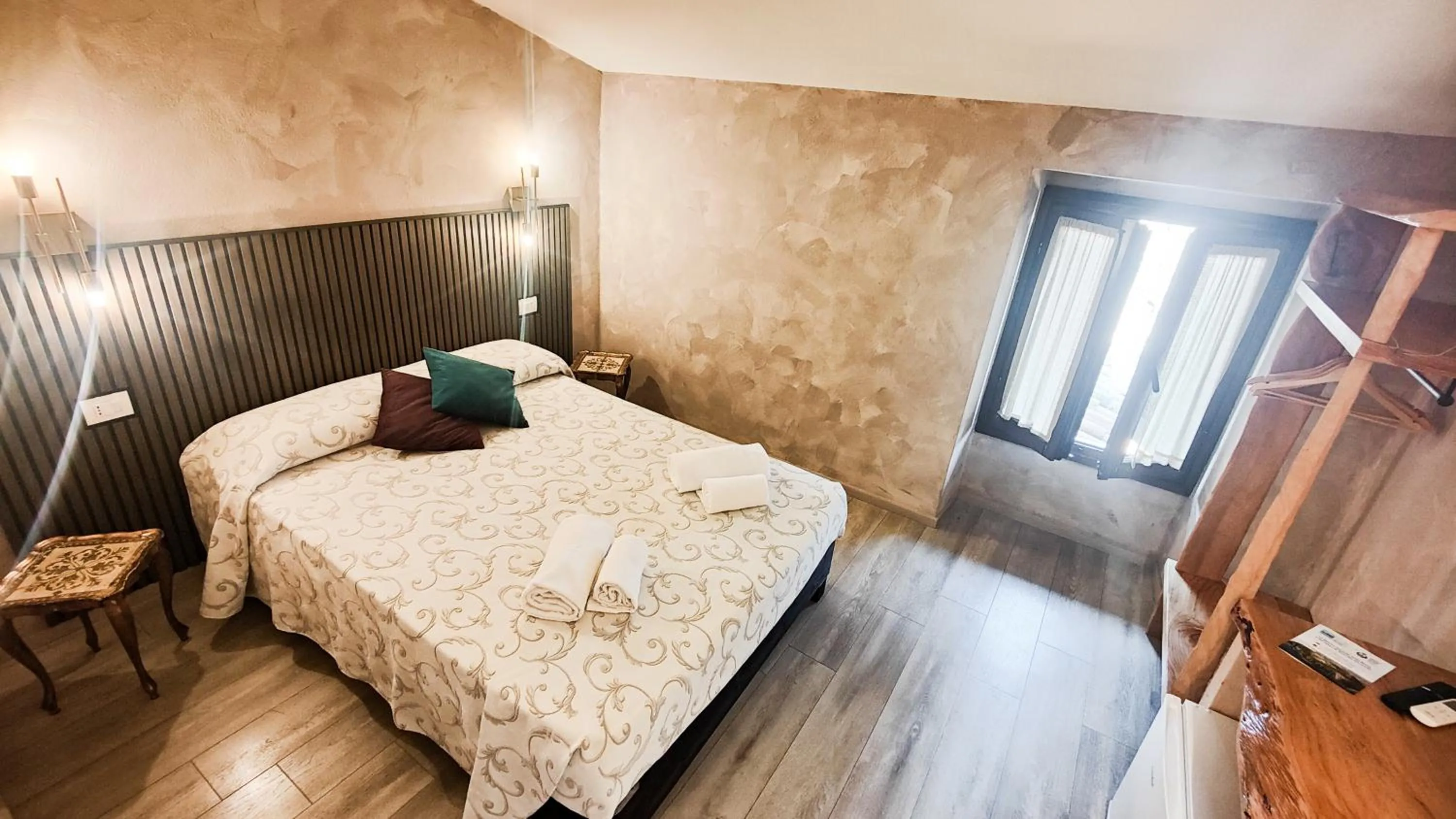 Bed in Albergo B&B Tenesi