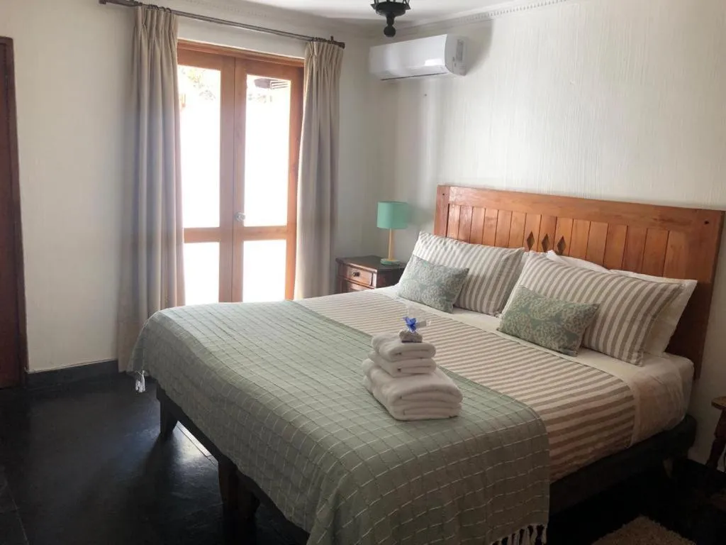 Bedroom, Bed in Casa Arrayán