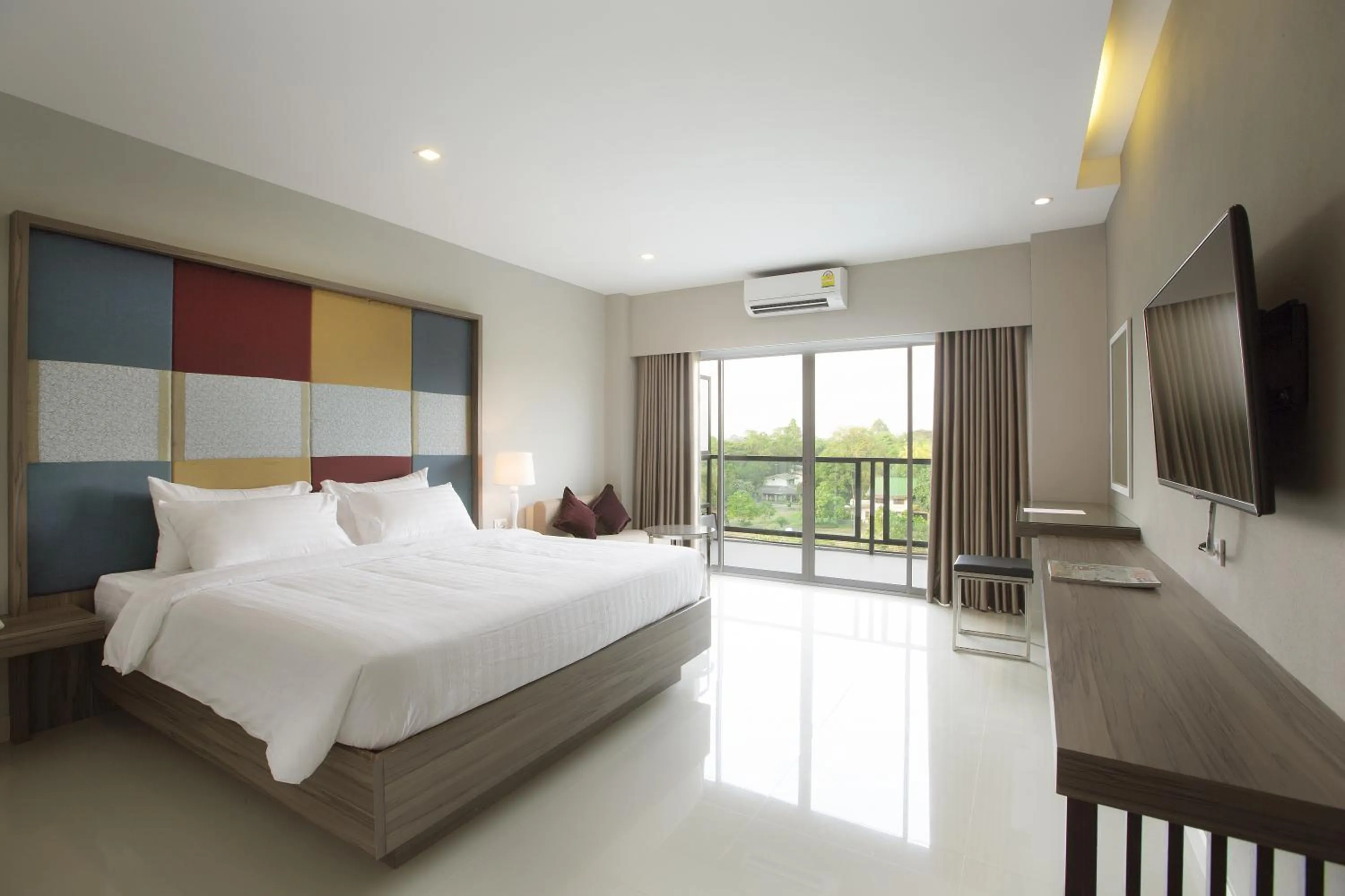 Photo of the whole room, Bed in V Hotel Ubon Ratchathani
