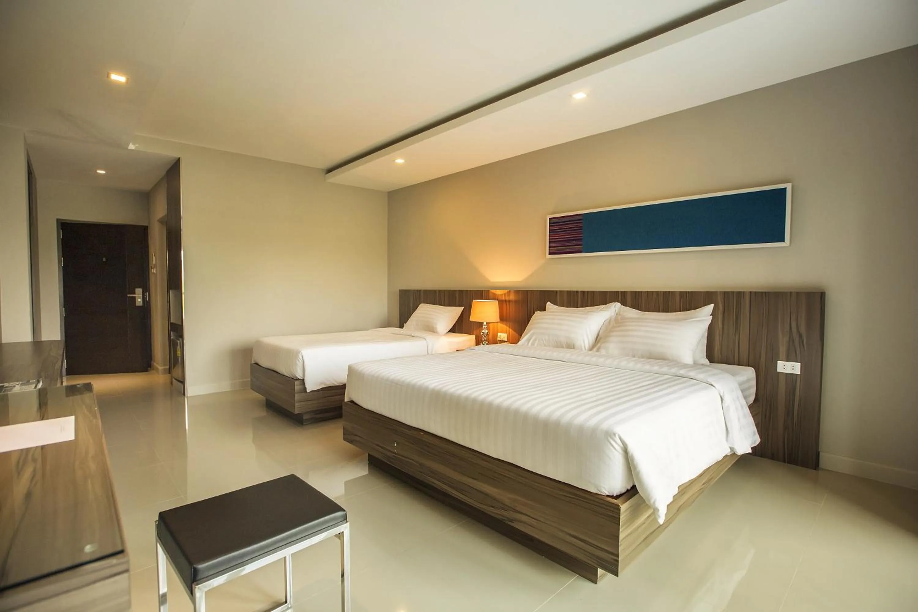 Photo of the whole room, Bed in V Hotel Ubon Ratchathani