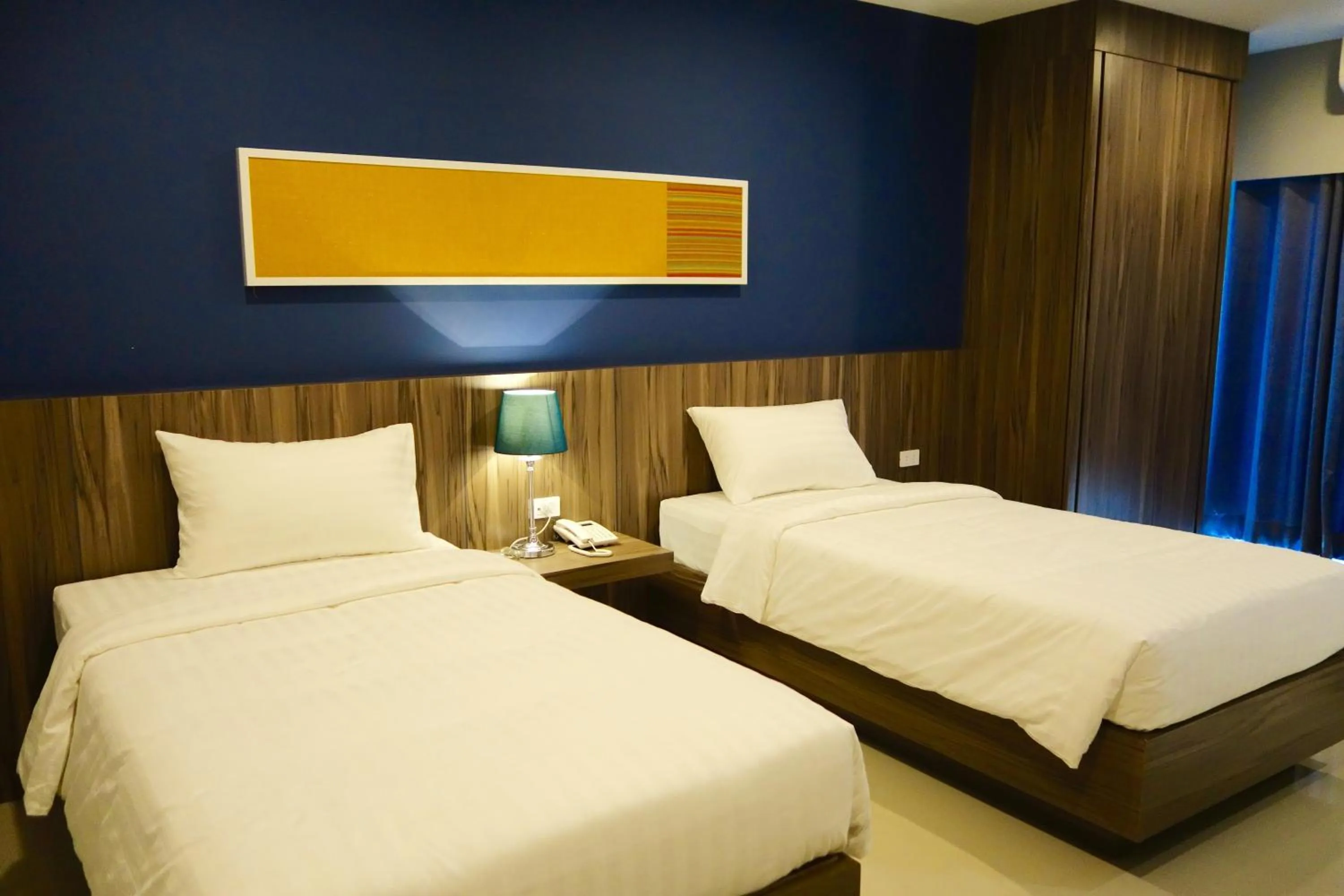 Photo of the whole room, Bed in V Hotel Ubon Ratchathani
