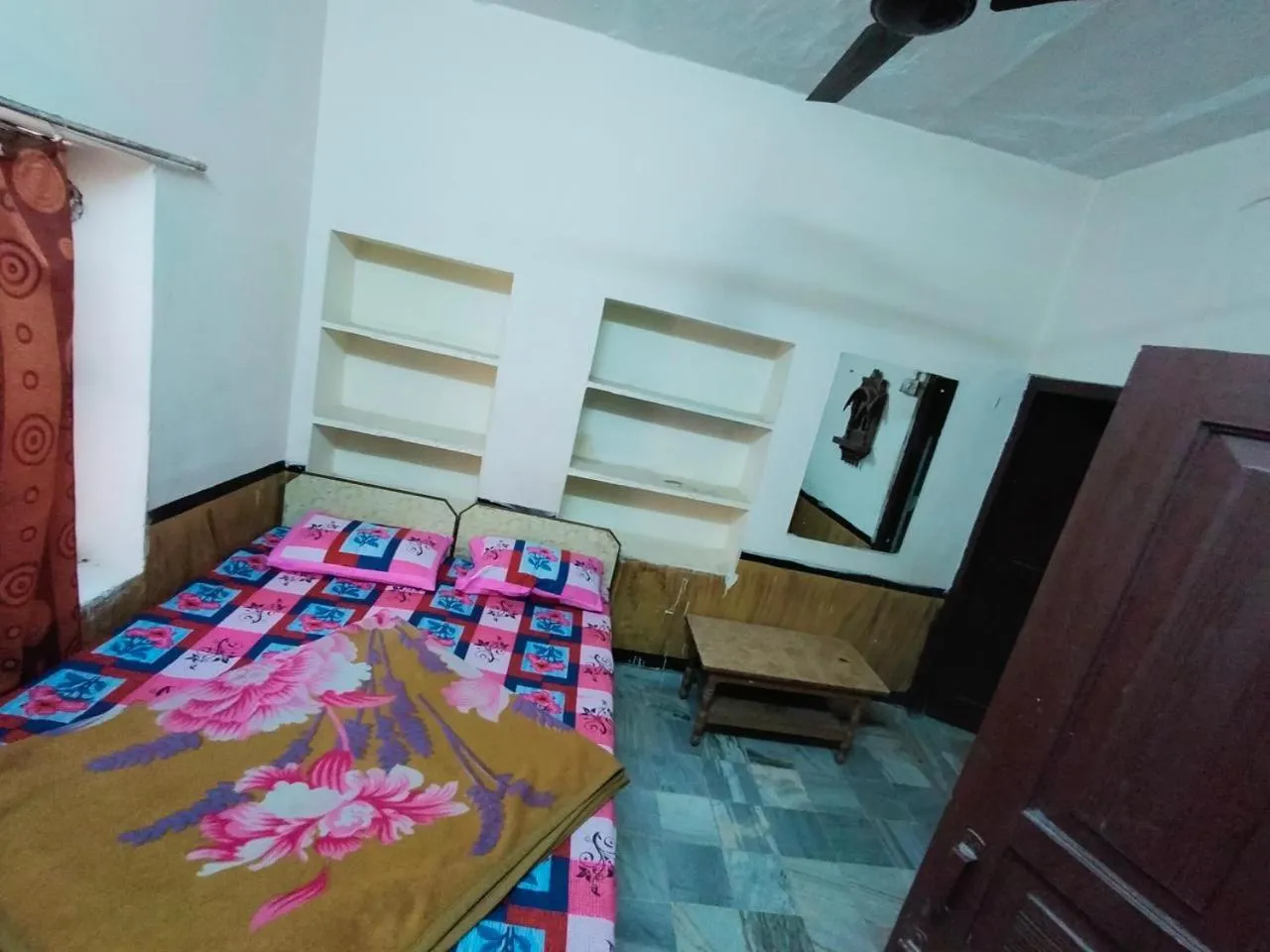 Bed in Priya guest house pushkar