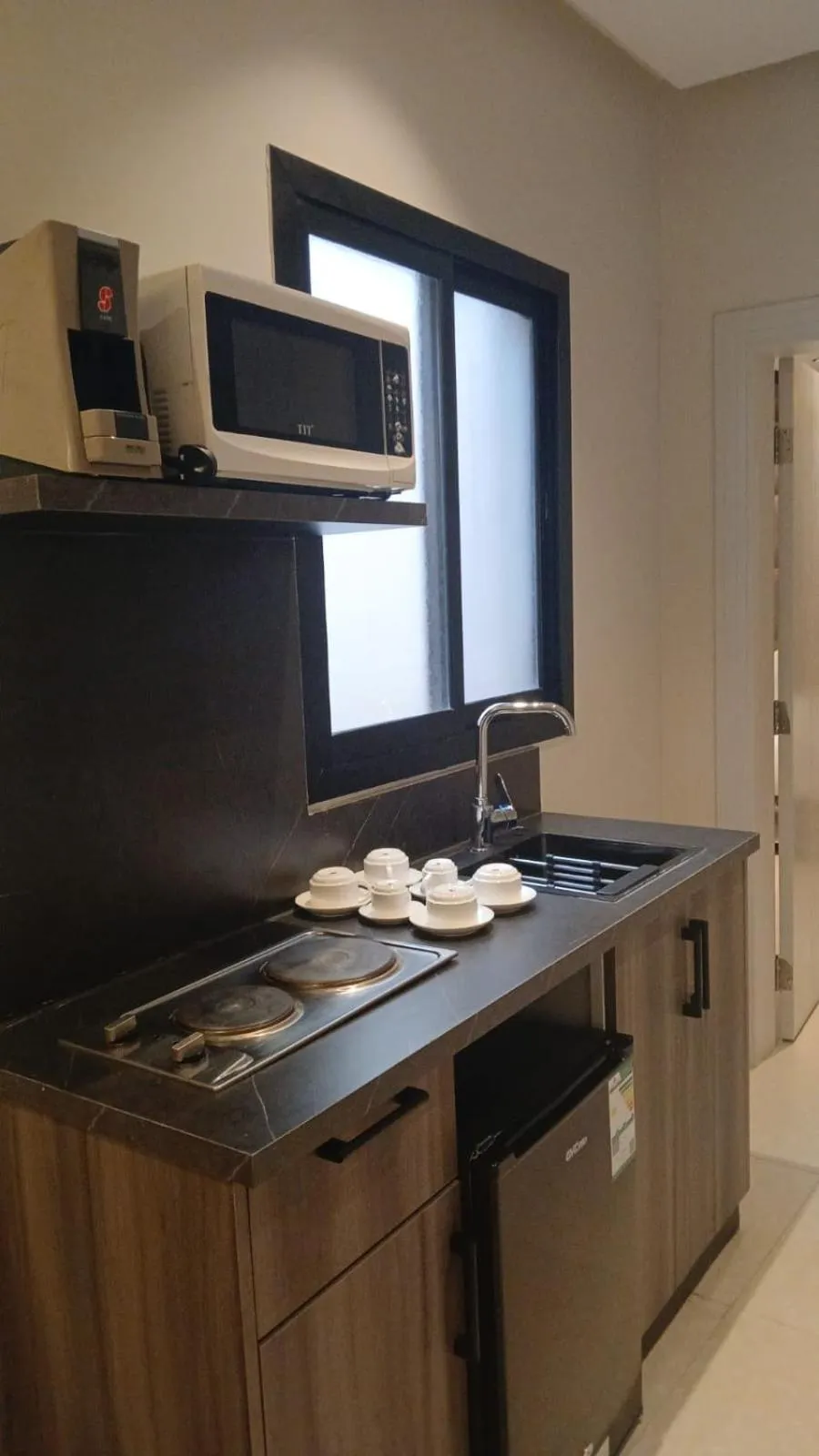 Kitchen or kitchenette in XYZ Hotel Qurtoba