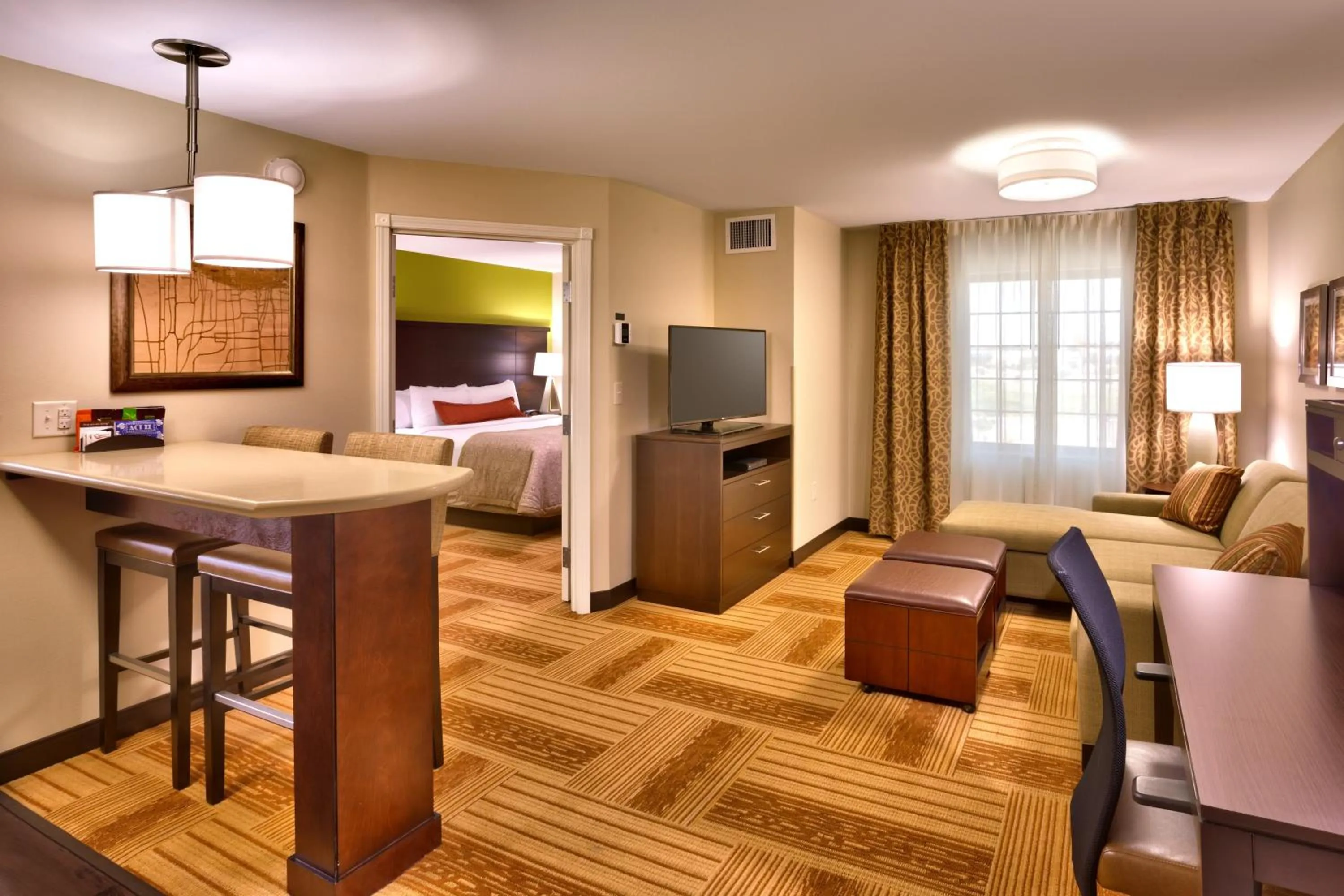 Photo of the whole room, Bed in Staybridge Suites Cheyenne by IHG
