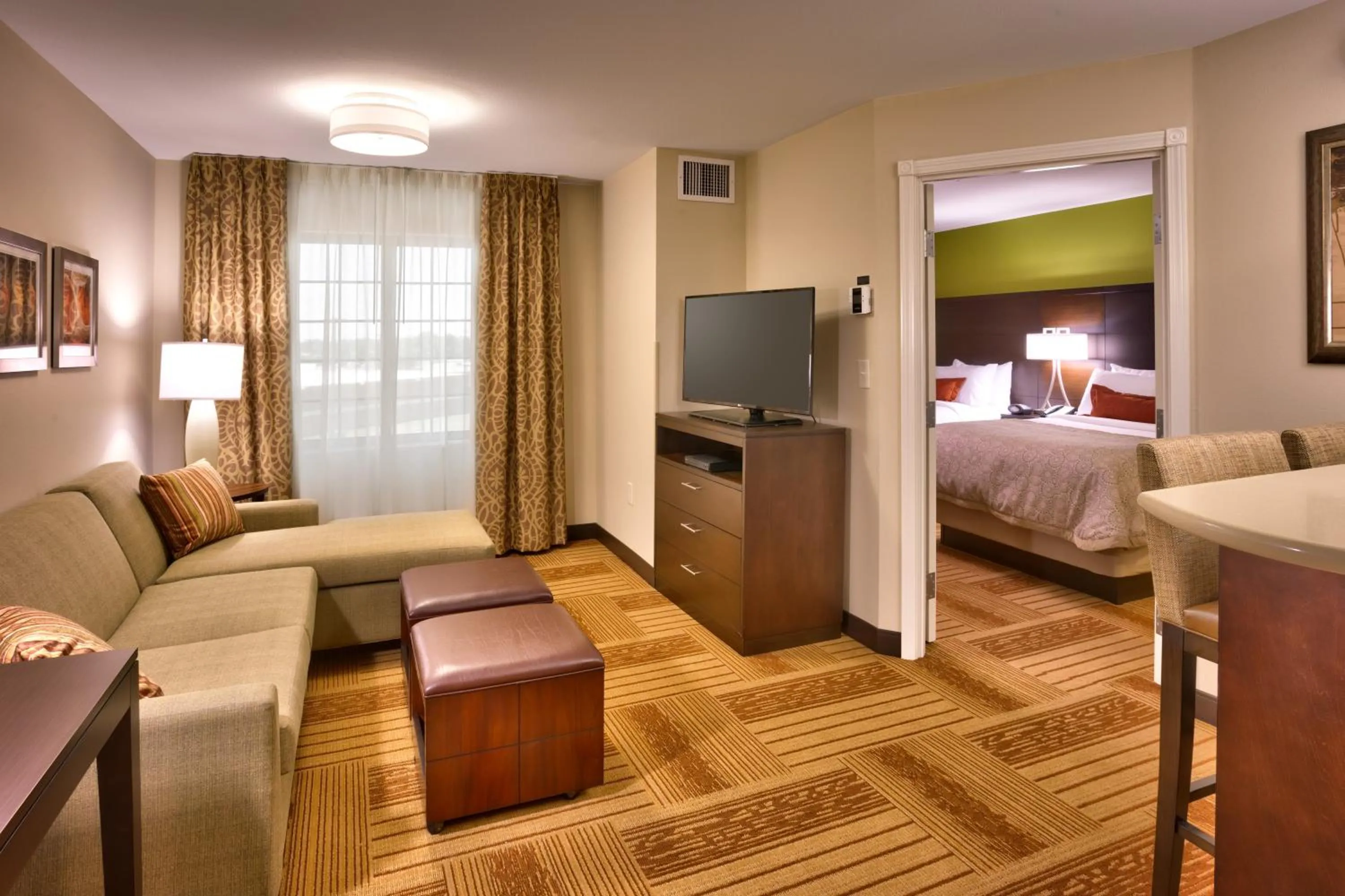 Photo of the whole room, Bed in Staybridge Suites Cheyenne by IHG