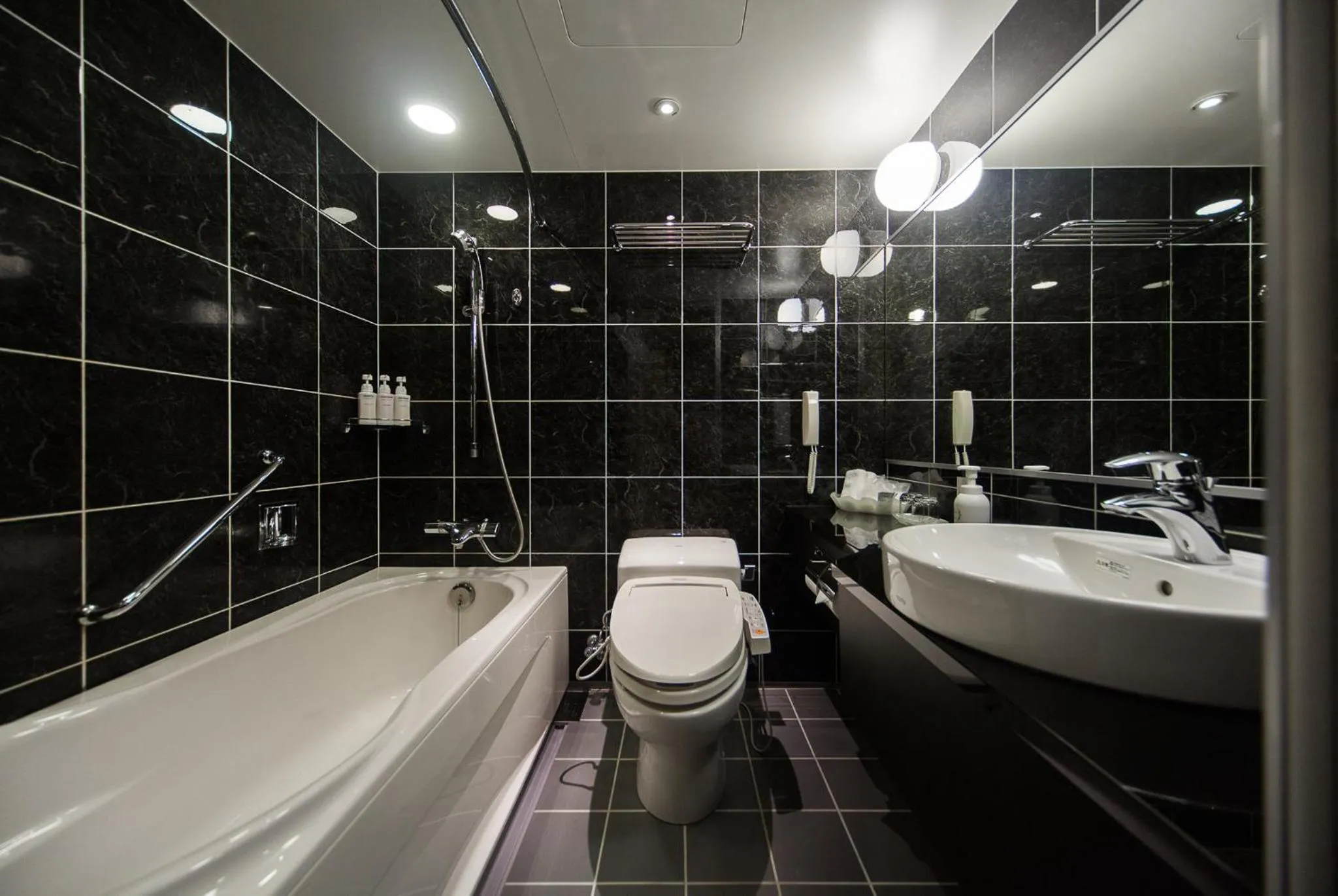 Bathroom in ANA Crowne Plaza Matsuyama by IHG