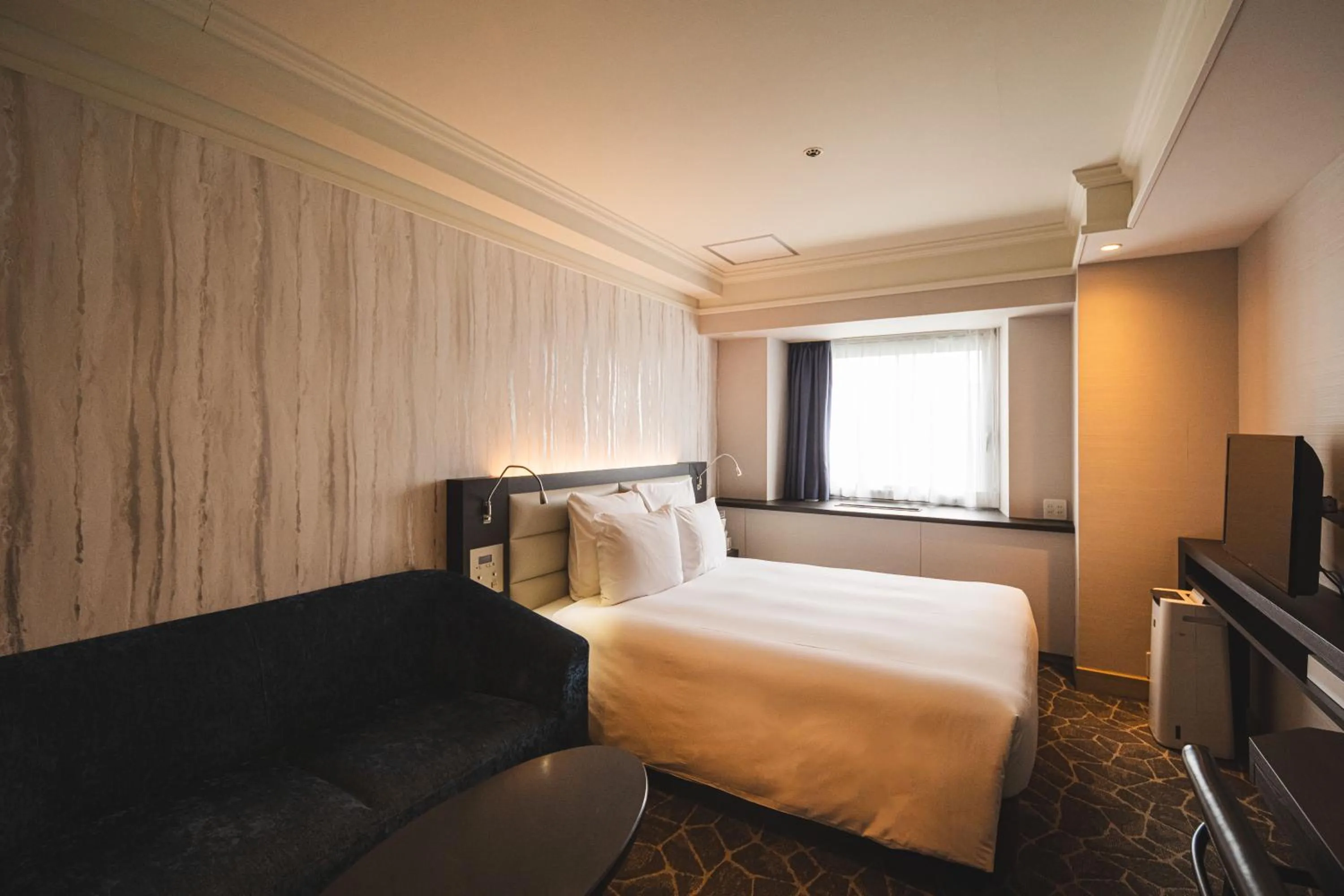 Photo of the whole room, Bed in ANA Crowne Plaza Matsuyama by IHG