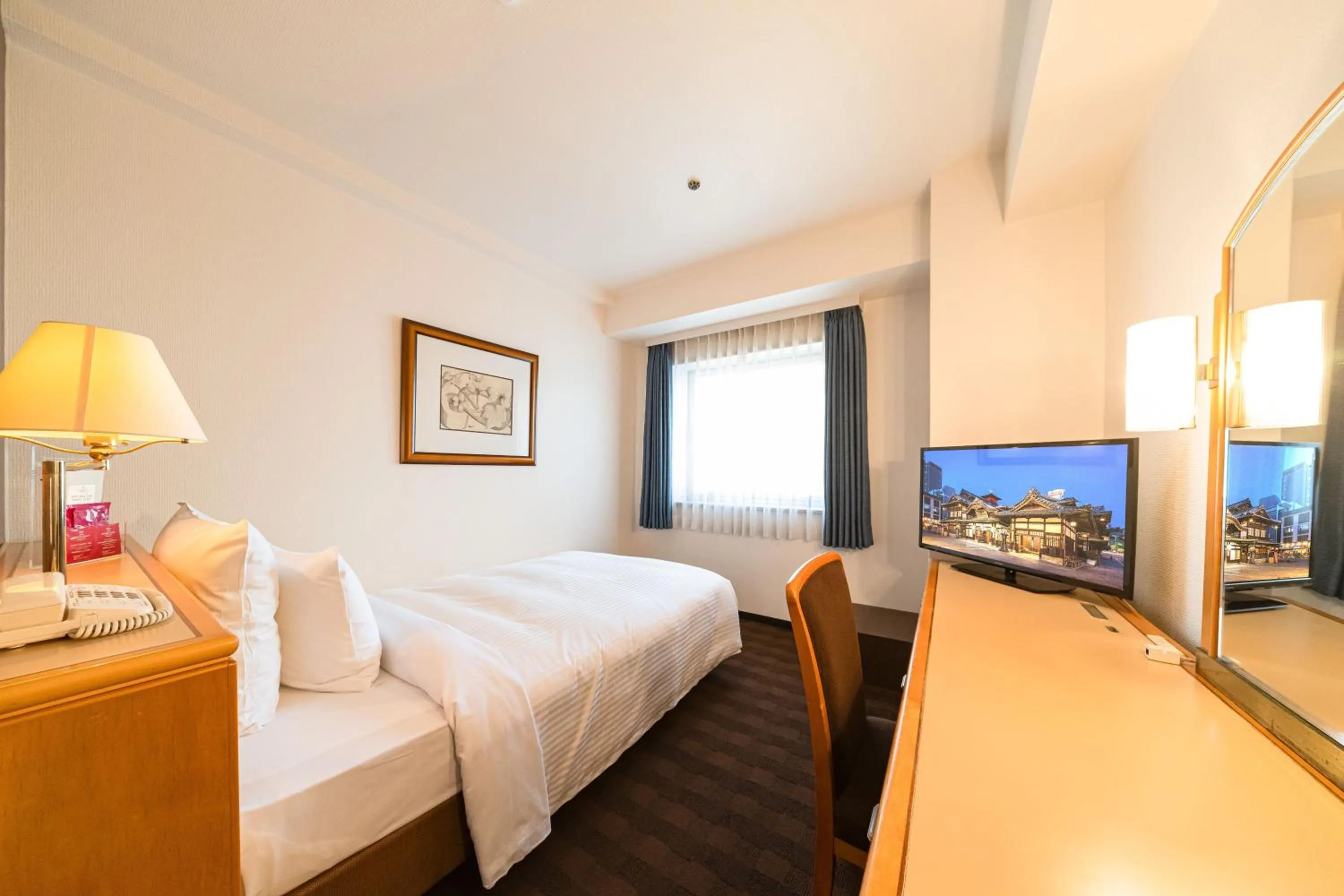 Photo of the whole room, Bed in ANA Crowne Plaza Matsuyama by IHG