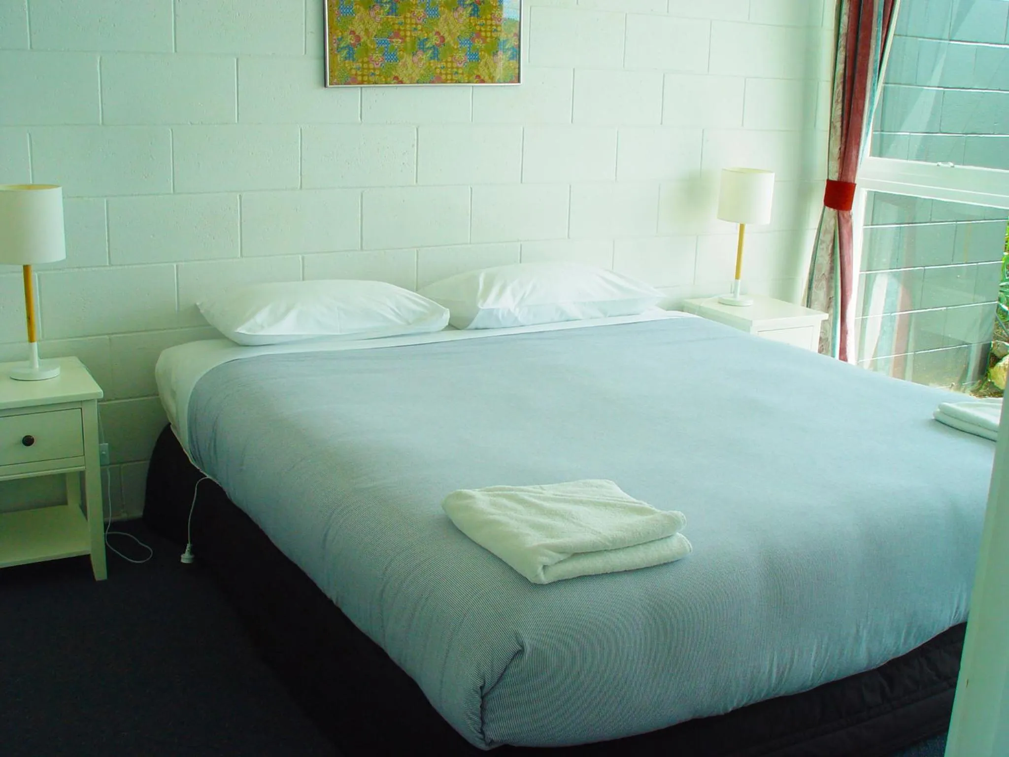 Bed in Mangonui Motel