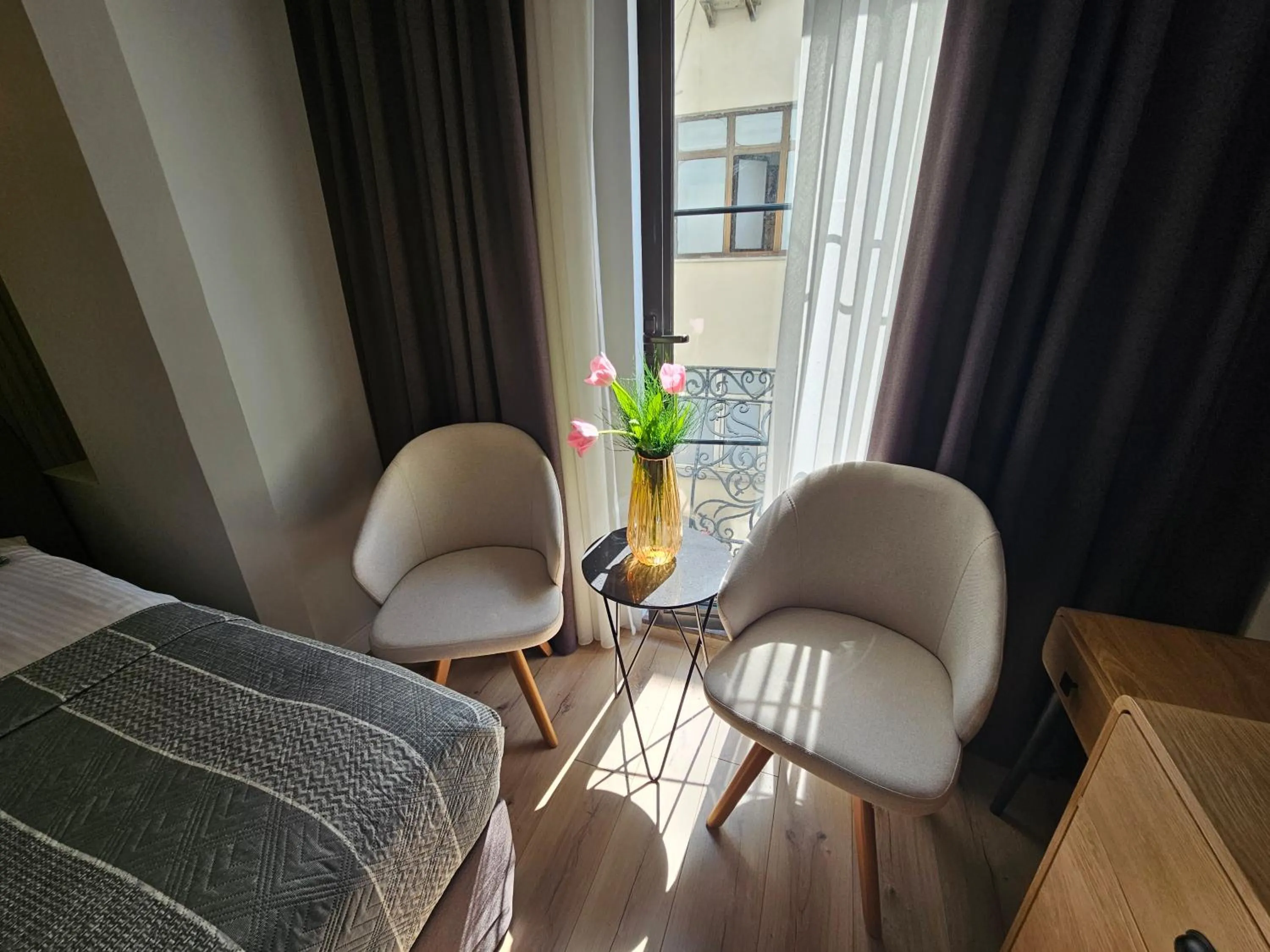 Seating area, Bed in Anthemis Hotel