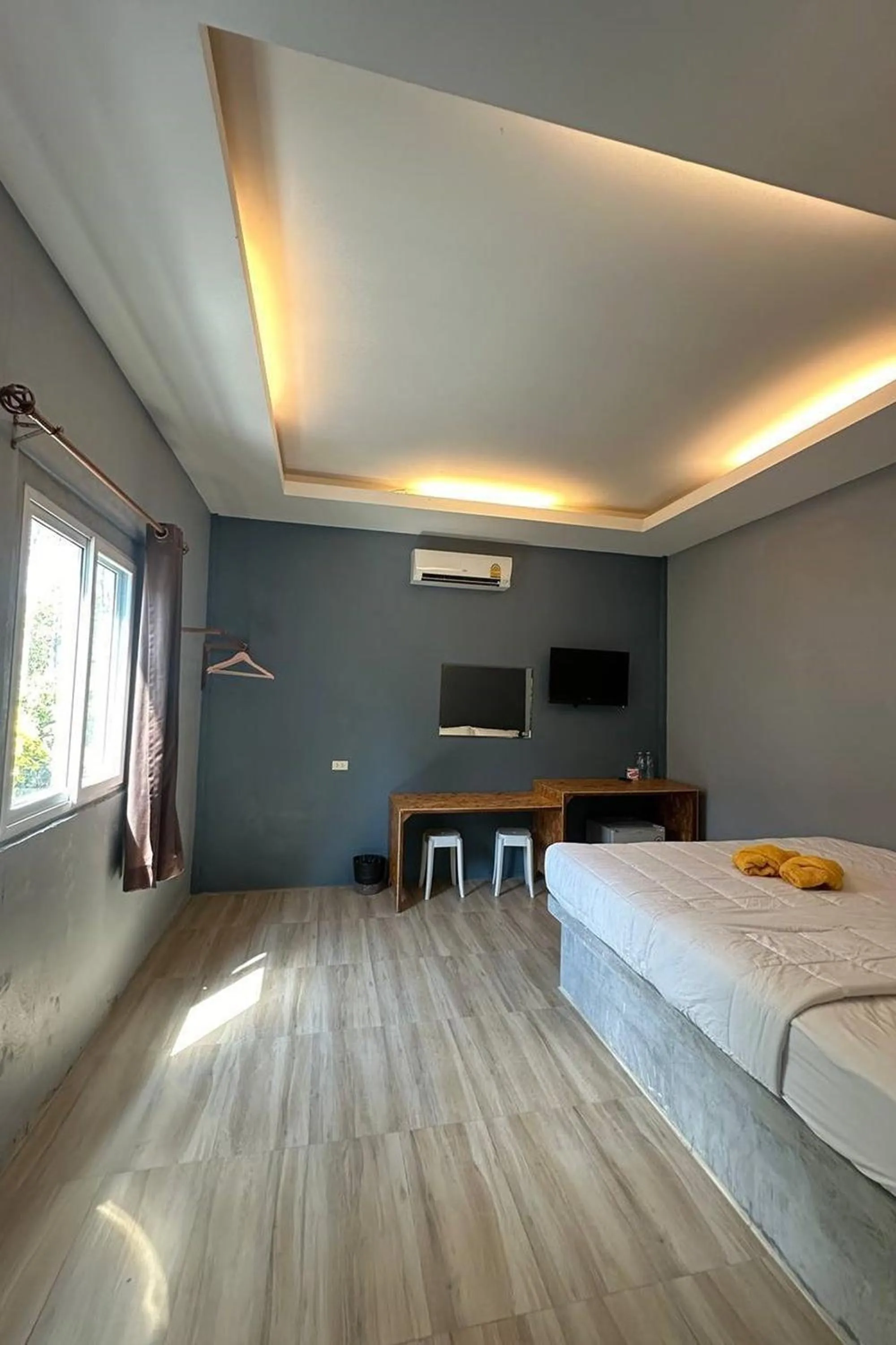 Bed in Golden Palm Resort