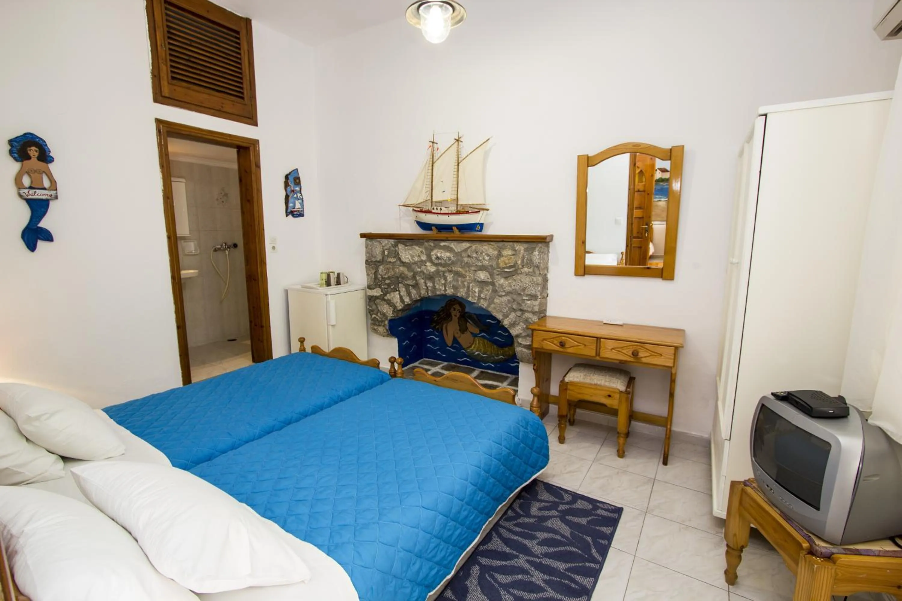 Bed in Symi Center Hotel