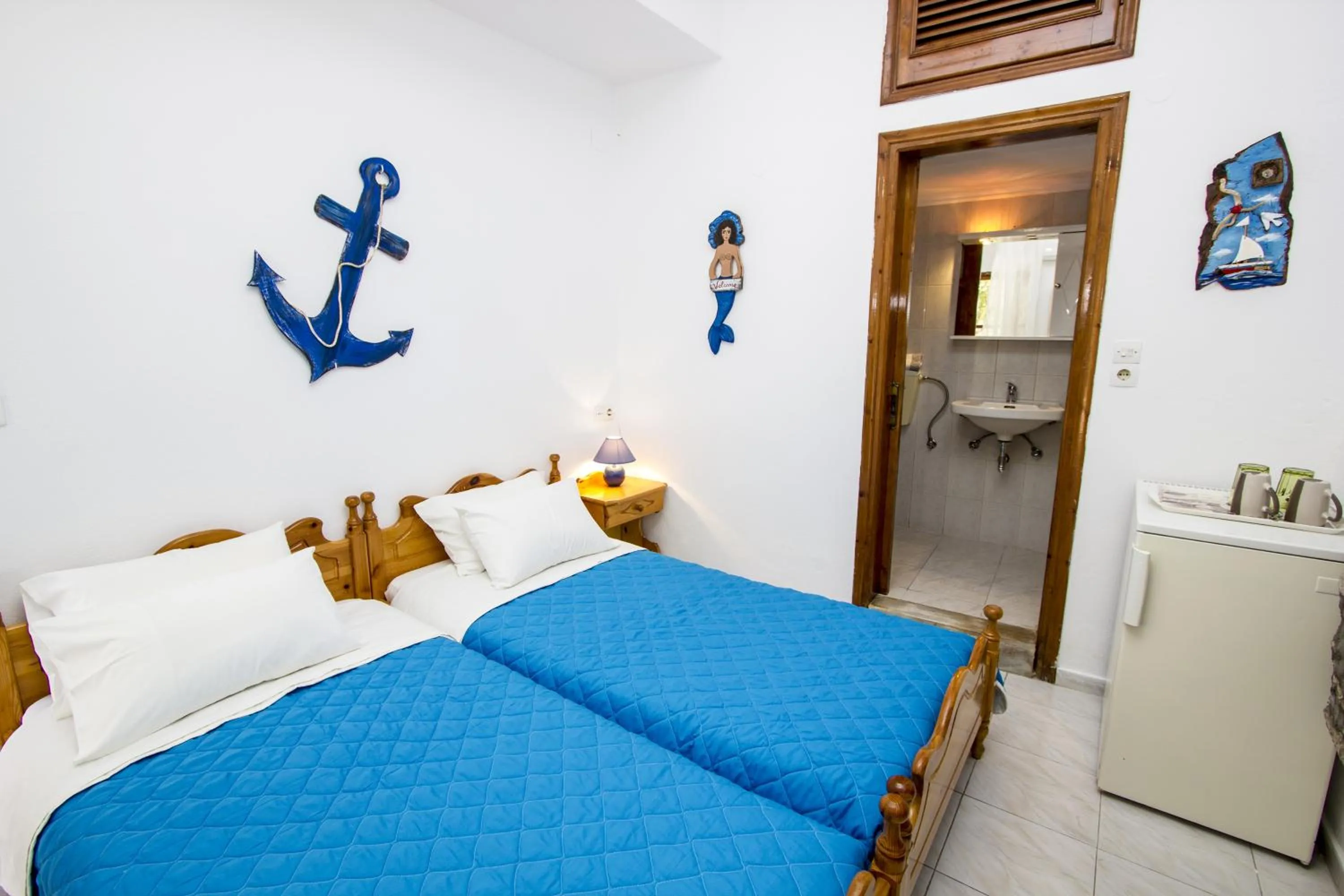 Bed in Symi Center Hotel