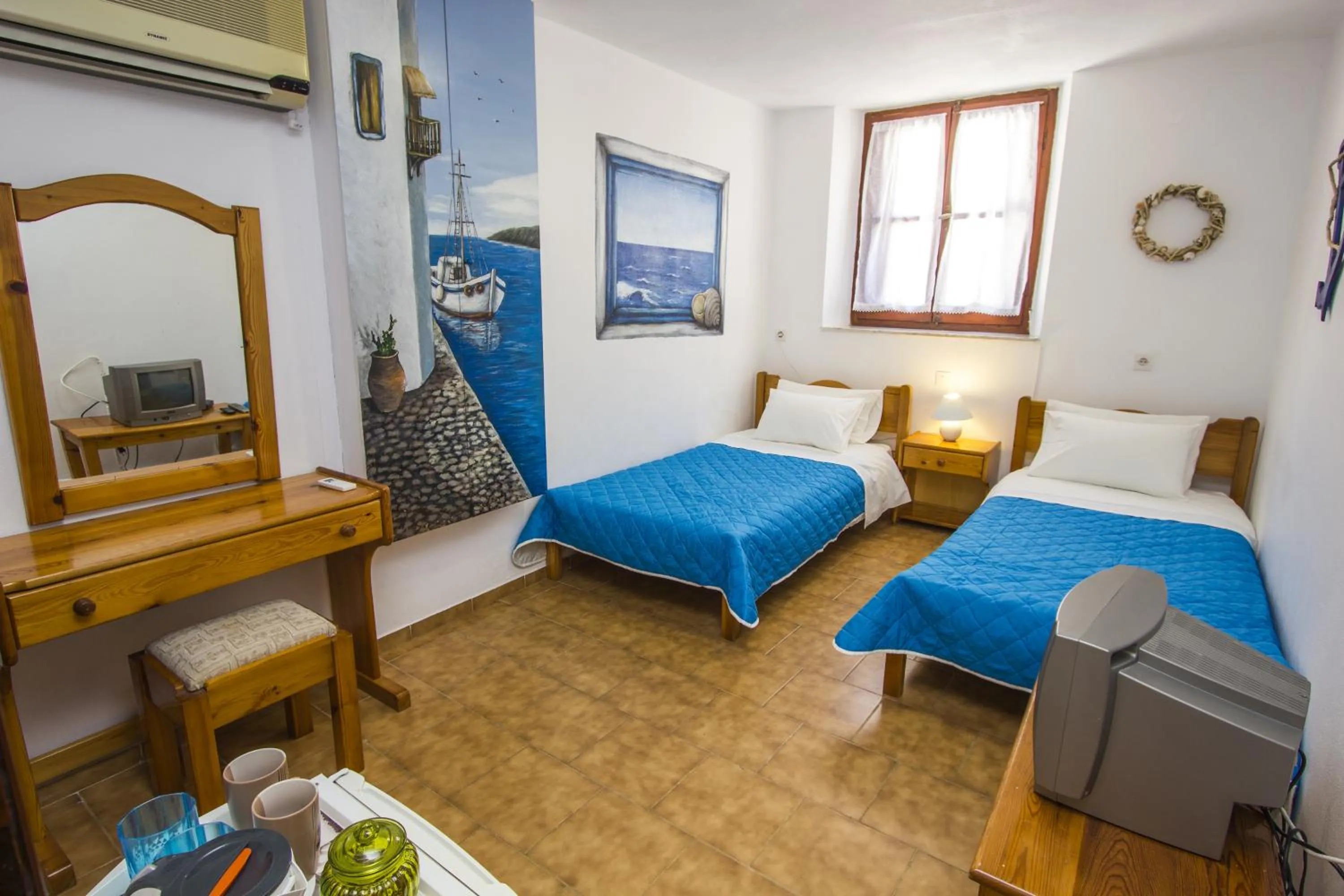 Photo of the whole room, Bed in Symi Center Hotel