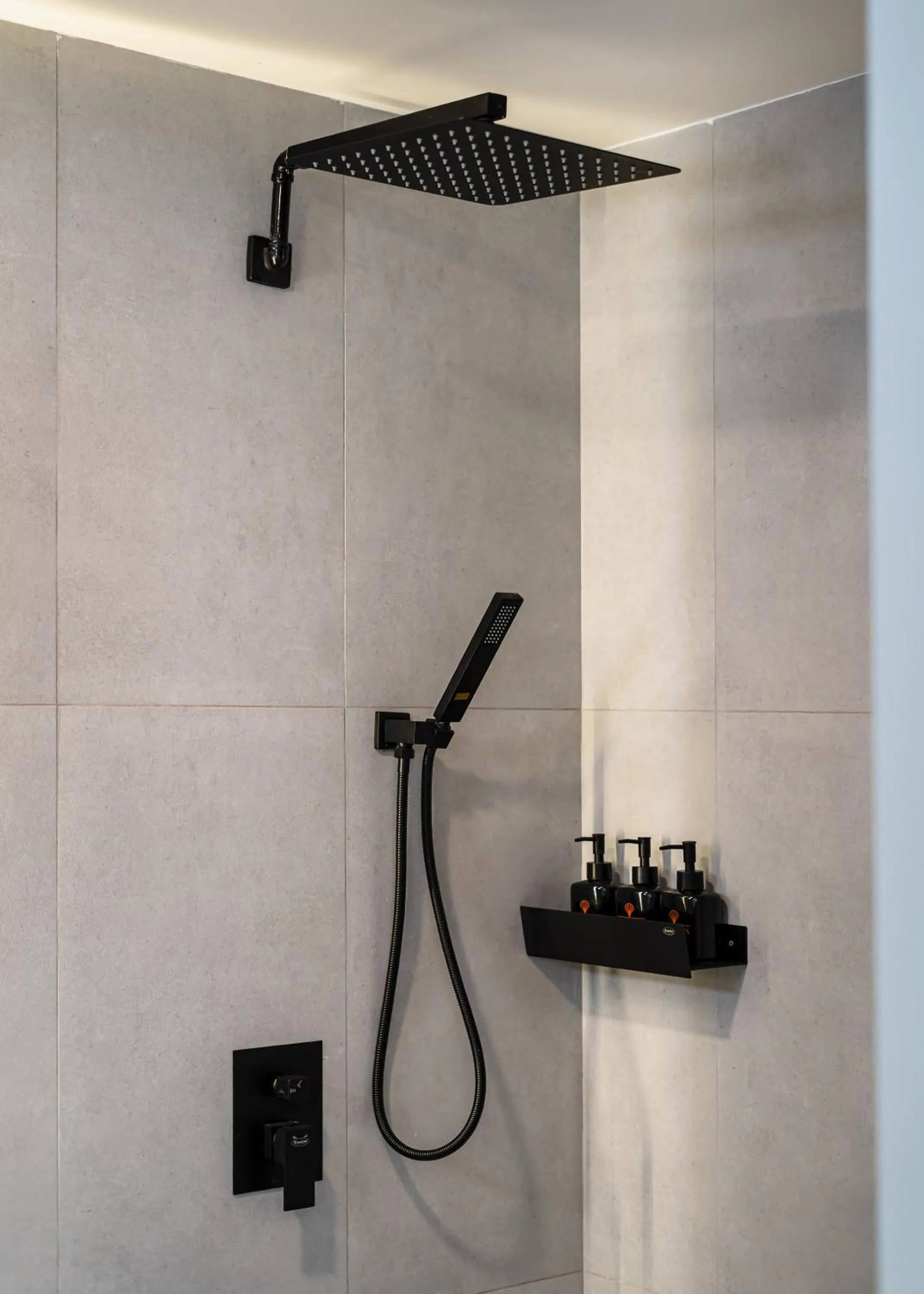 Shower in Metrolux City Contemporary Hotel
