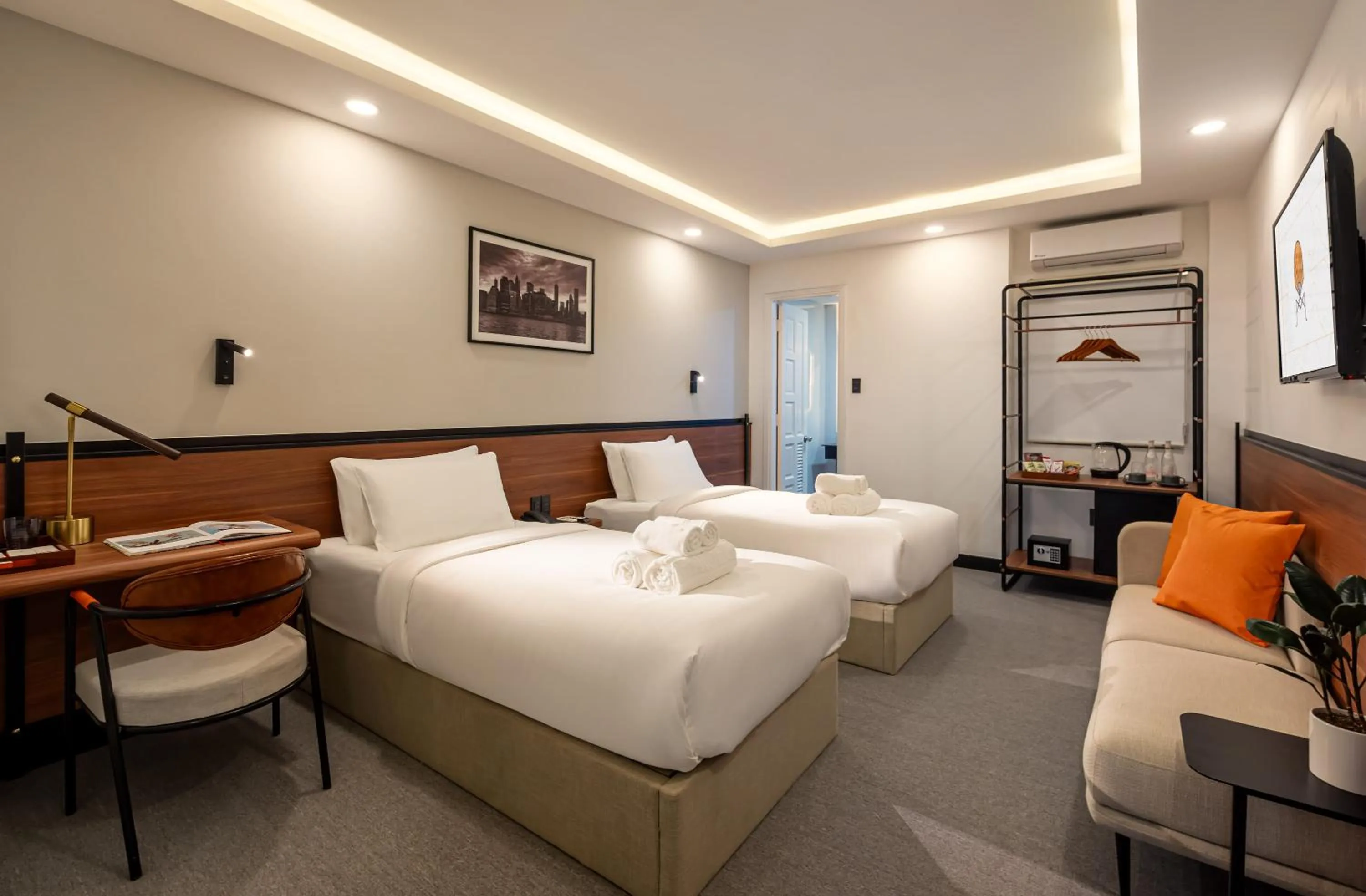 Photo of the whole room, Bed in Metrolux City Contemporary Hotel