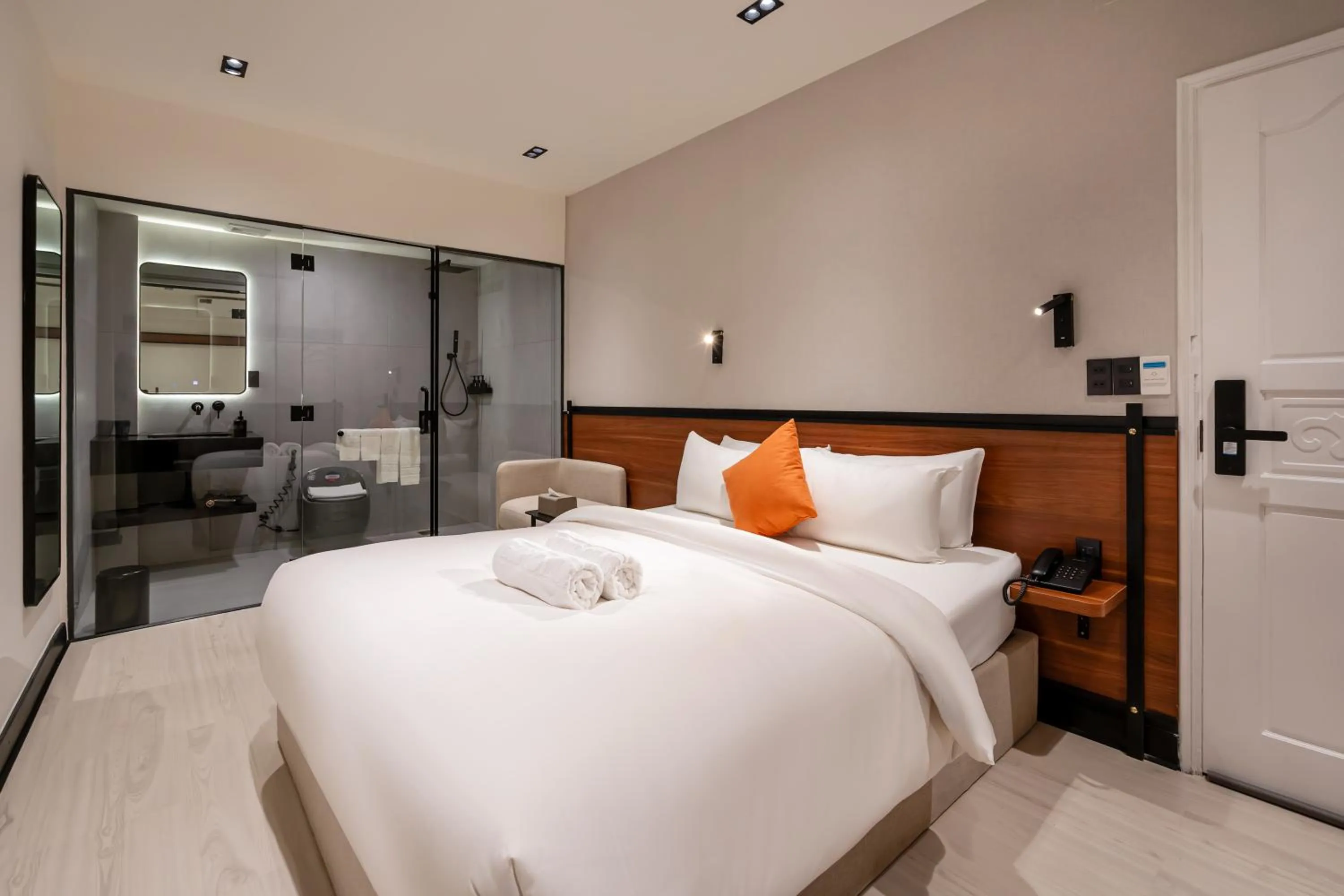 Bed in Metrolux City Contemporary Hotel
