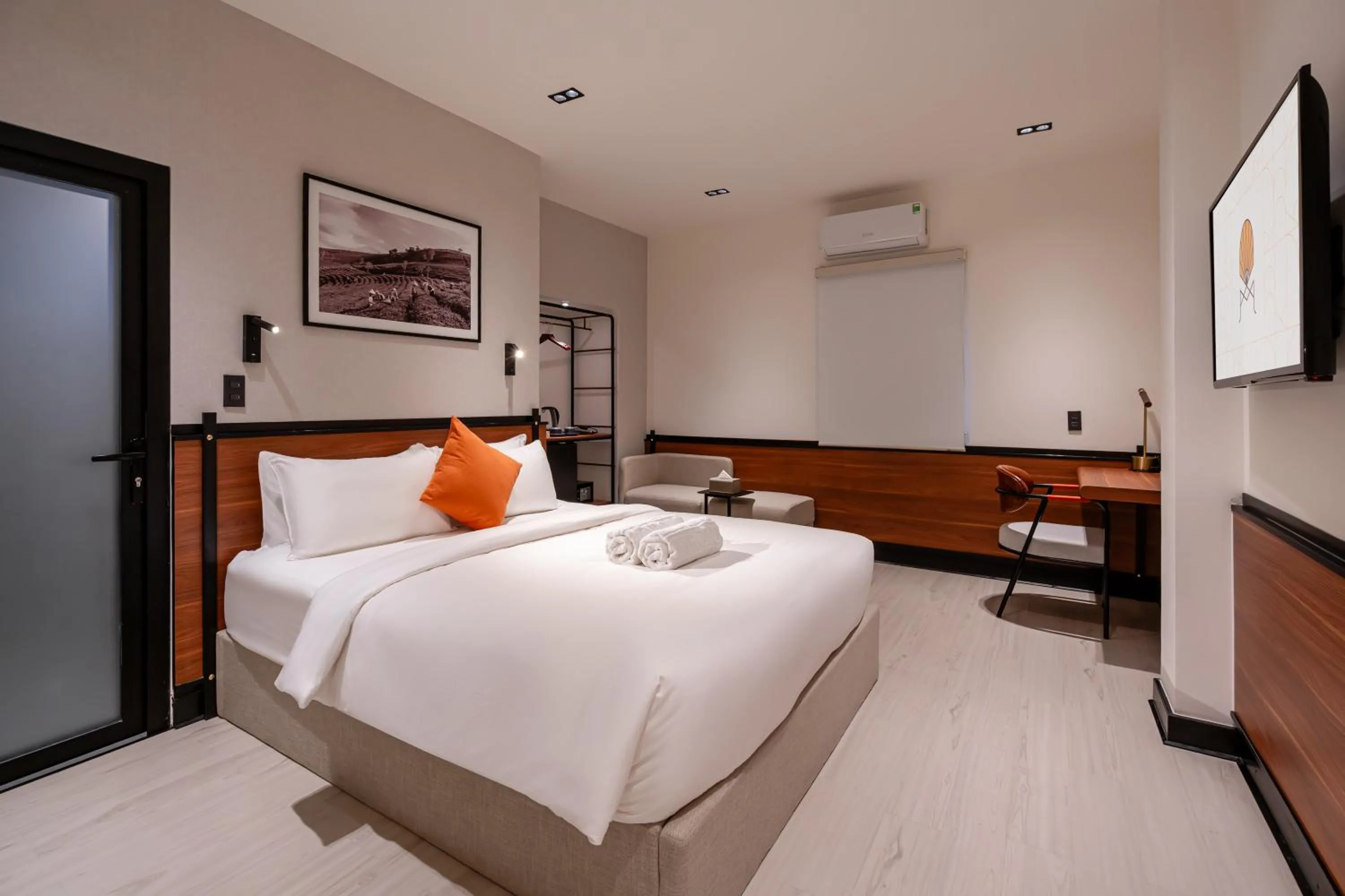 Bed in Metrolux City Contemporary Hotel