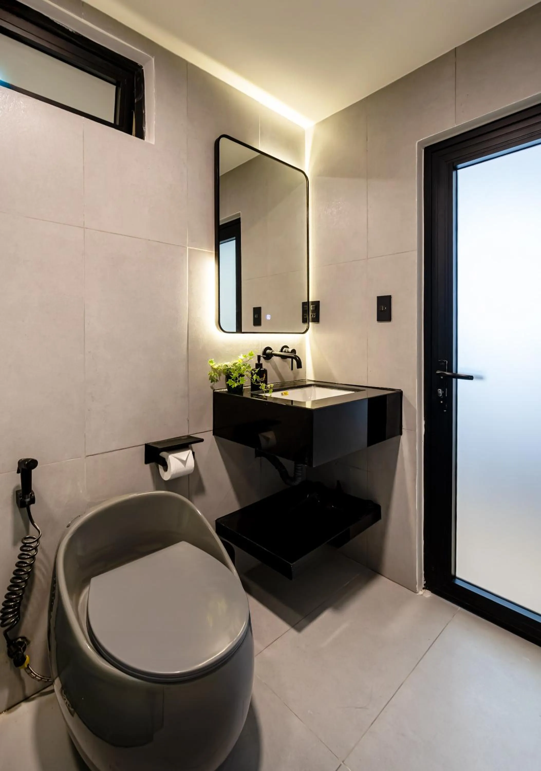 Bathroom in Metrolux City Contemporary Hotel
