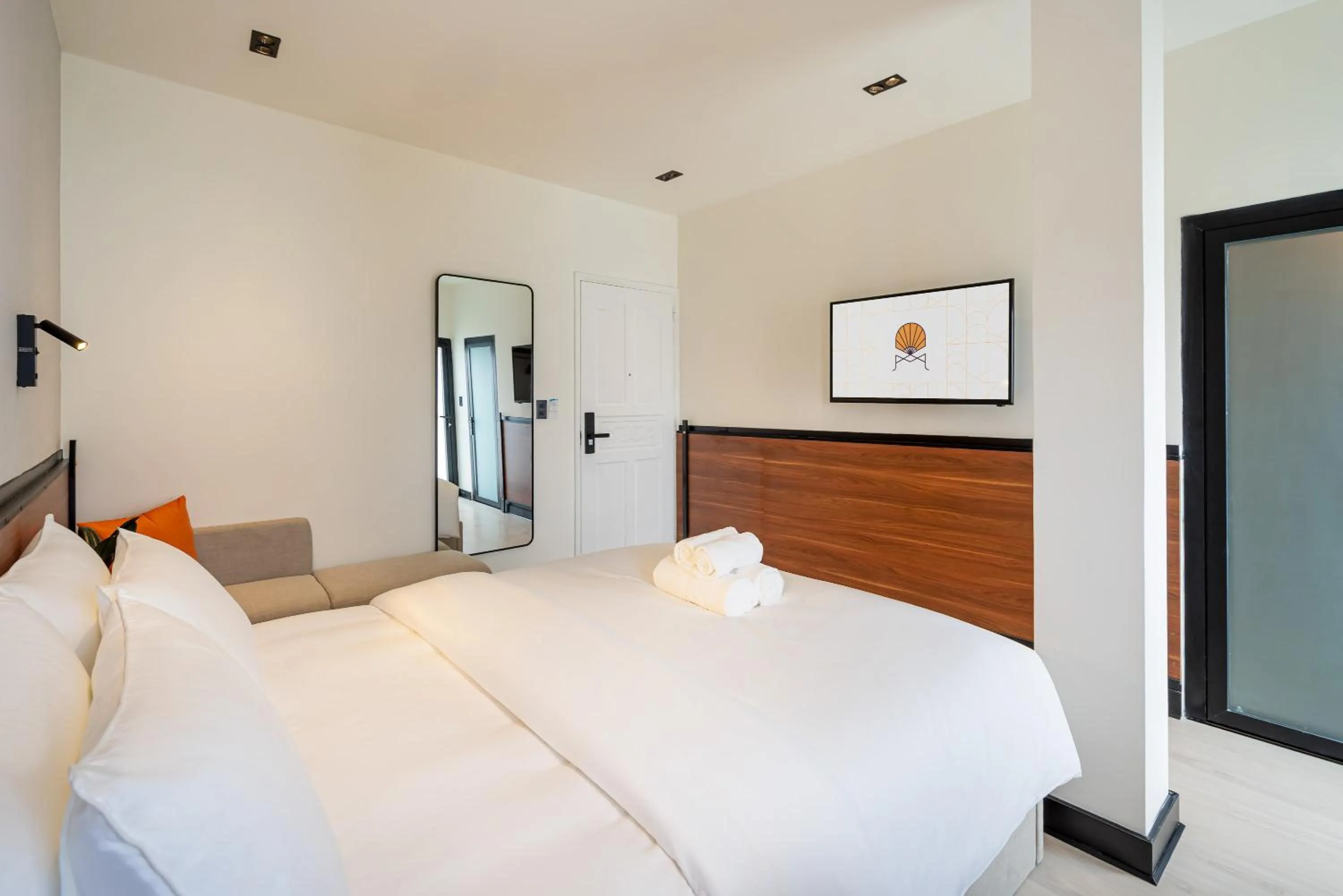 Bed in Metrolux City Contemporary Hotel