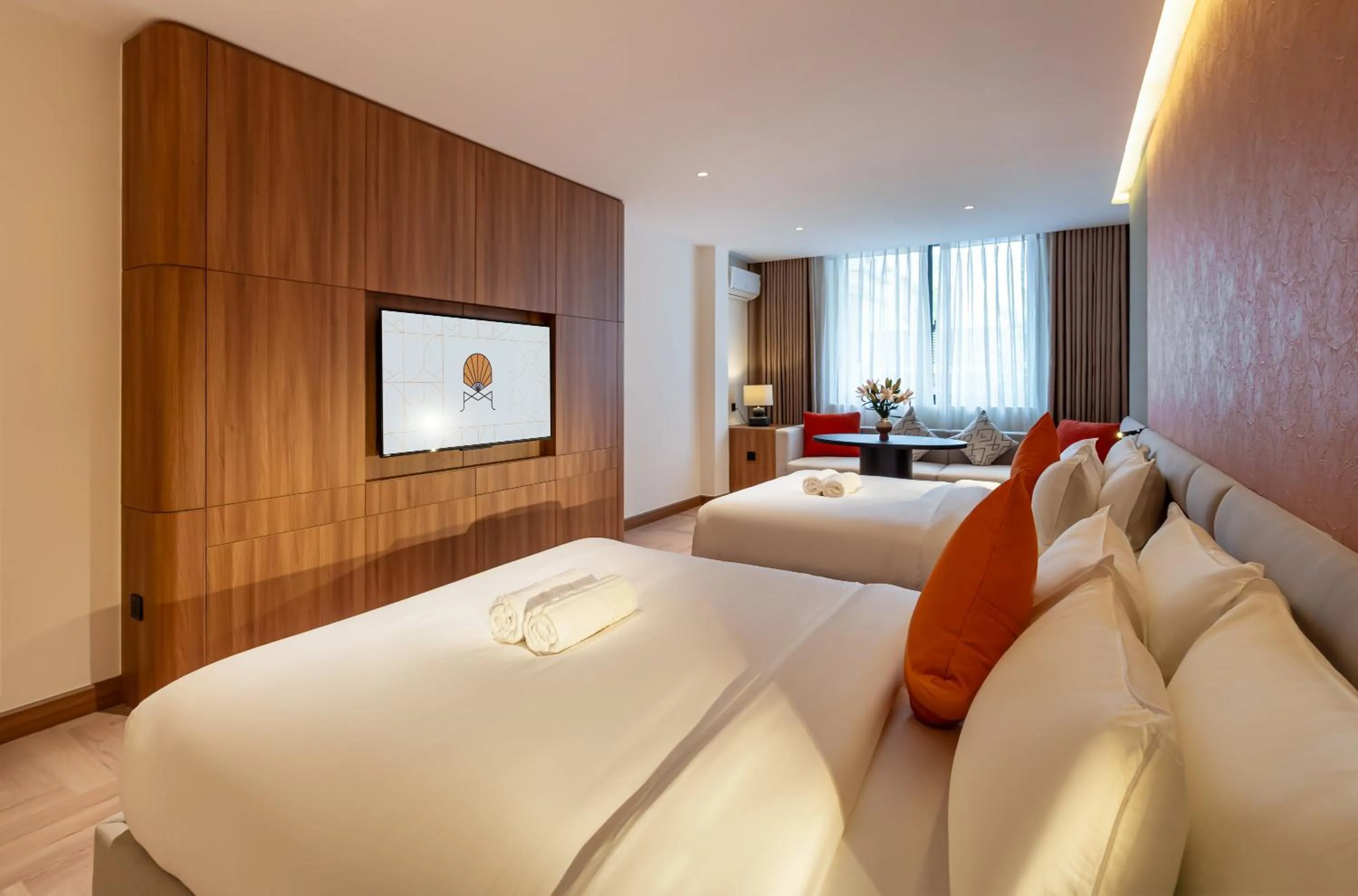 Bed in Metrolux City Contemporary Hotel