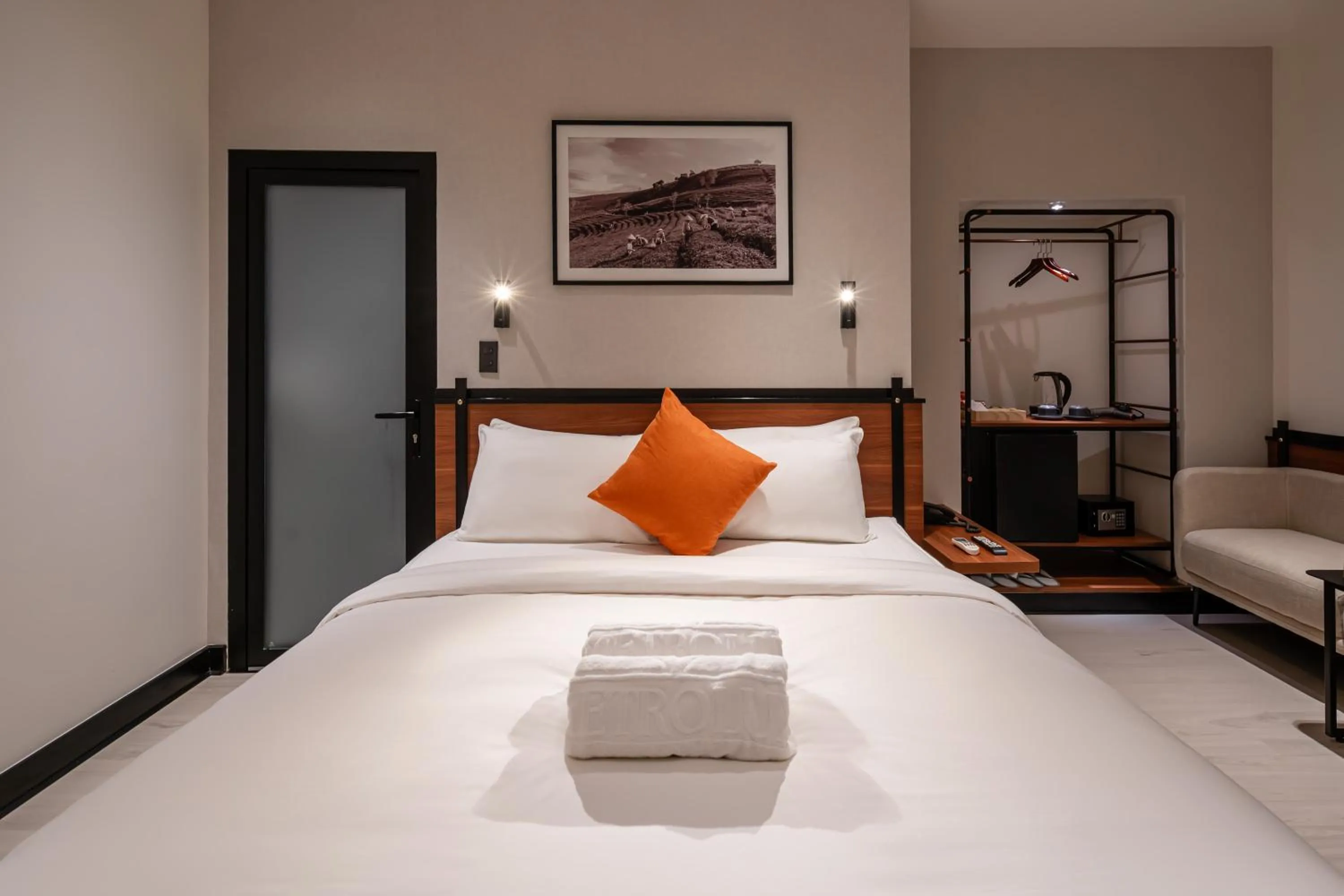 Bed in Metrolux City Contemporary Hotel