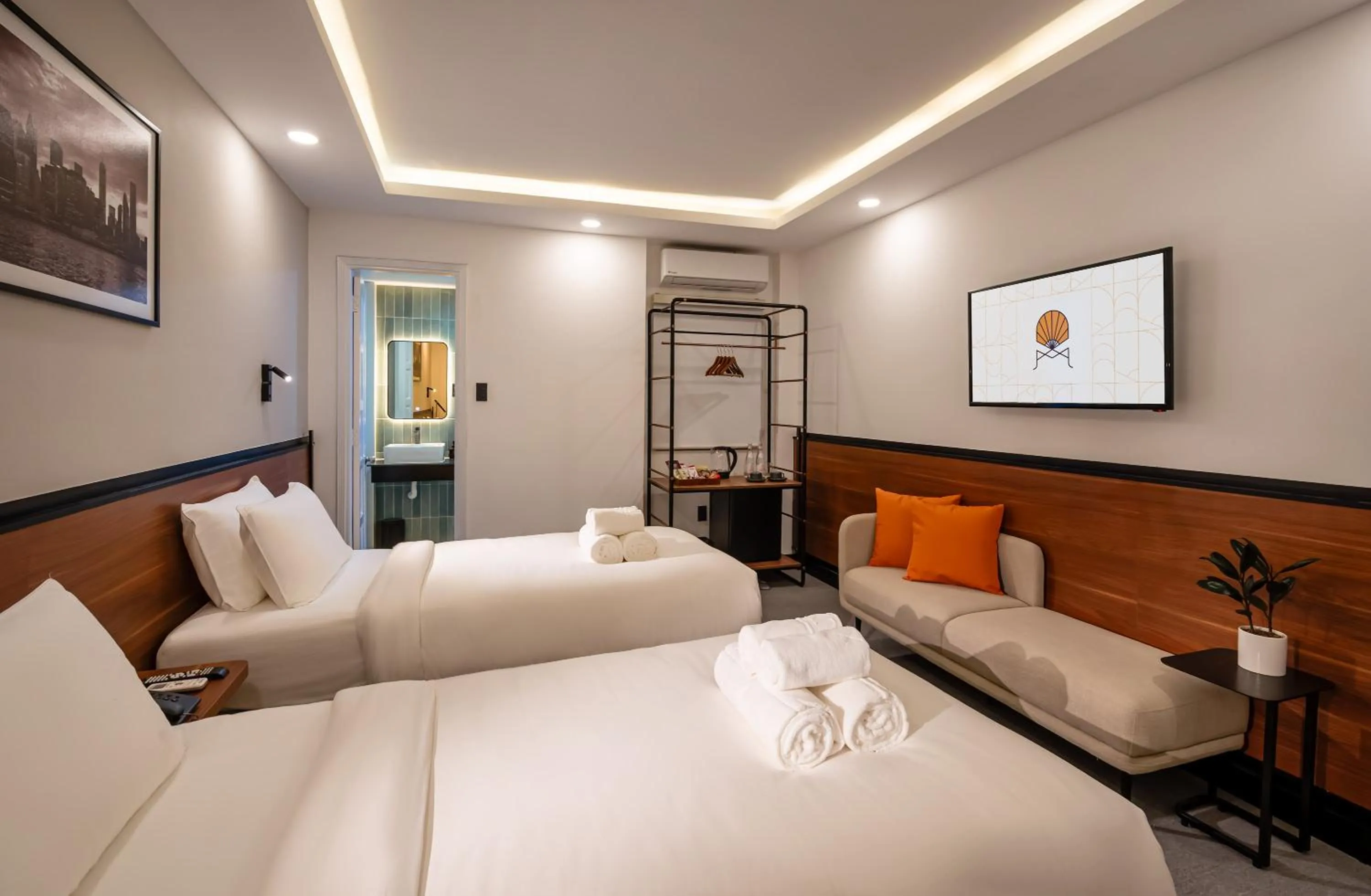 TV and multimedia, Bed in Metrolux City Contemporary Hotel
