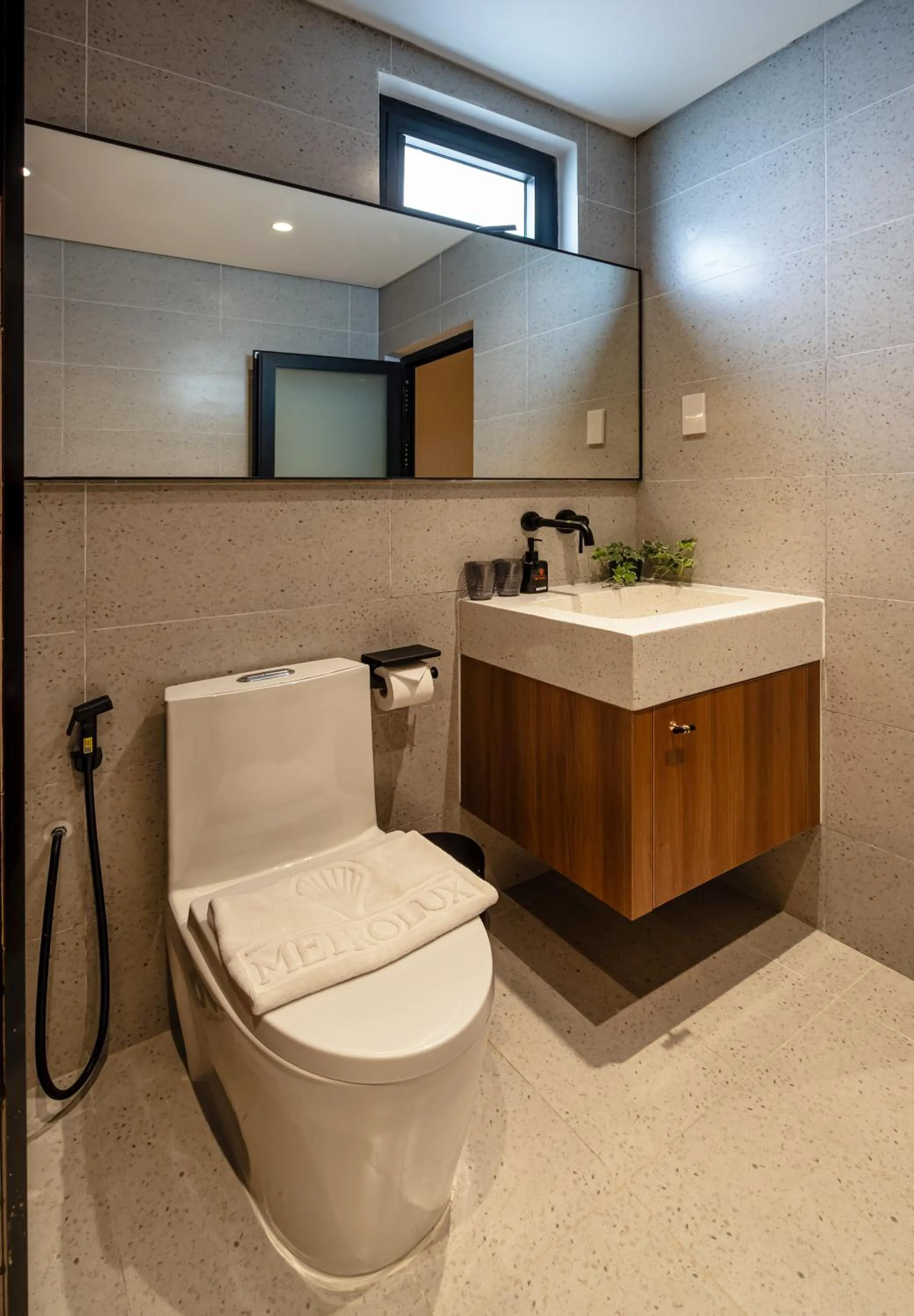 Toilet in Metrolux City Contemporary Hotel