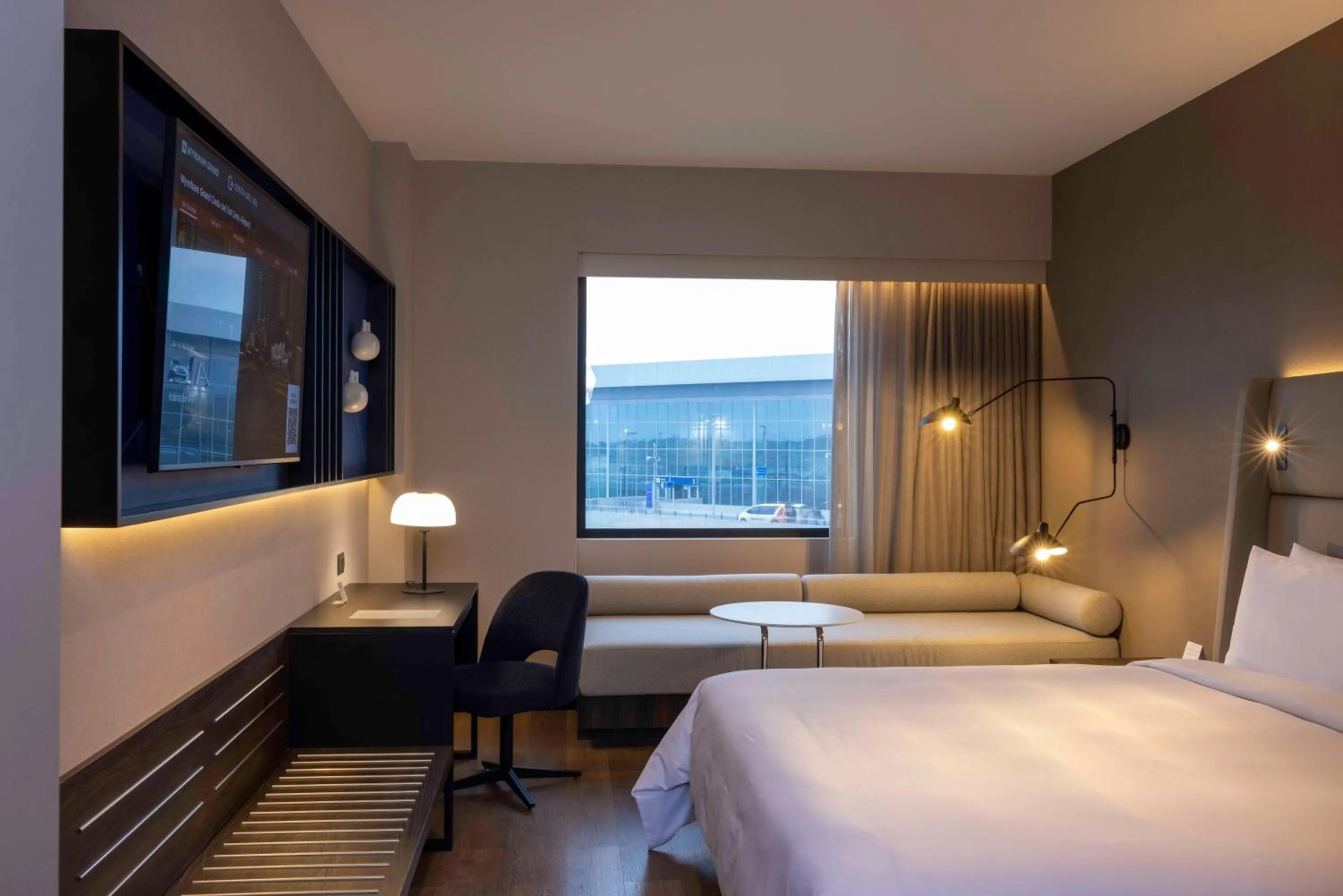 Photo of the whole room, Bed in Wyndham Grand Costa Del Sol Lima Airport