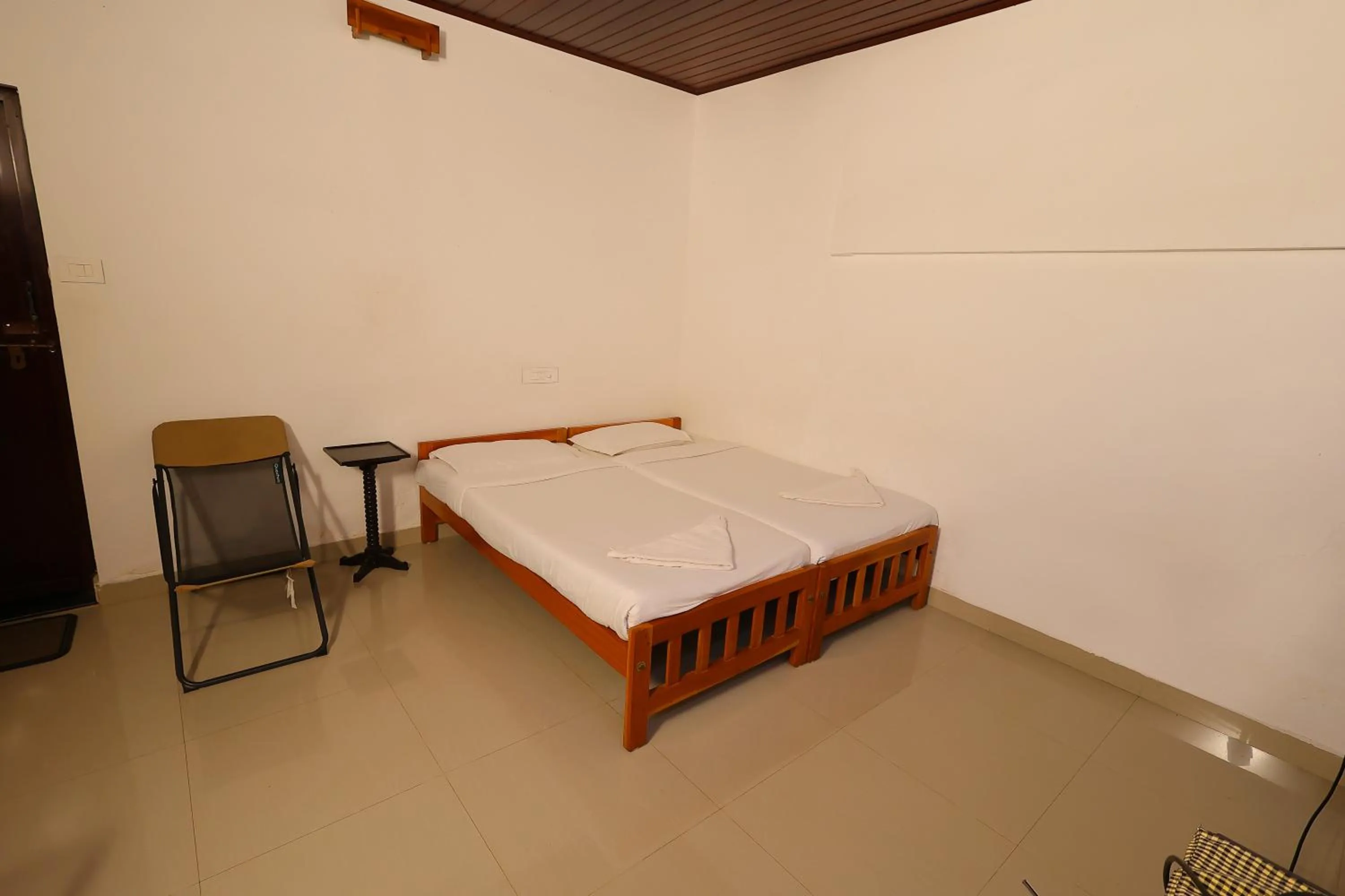 Bedroom, Bed in ILLIKKALAM Lakeside Cottages Kumarakom Kerala