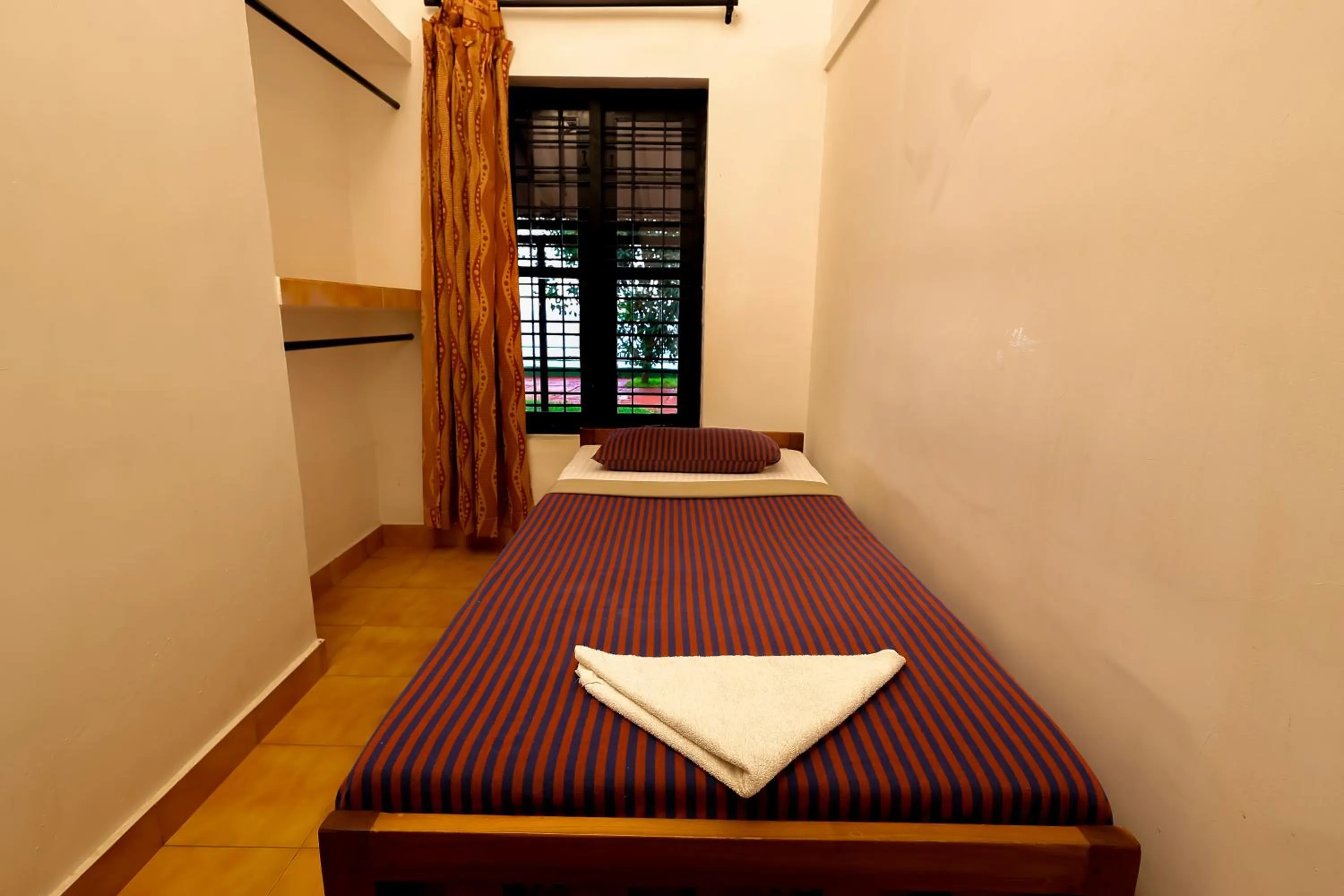 Bedroom, Bed in ILLIKKALAM Lakeside Cottages Kumarakom Kerala
