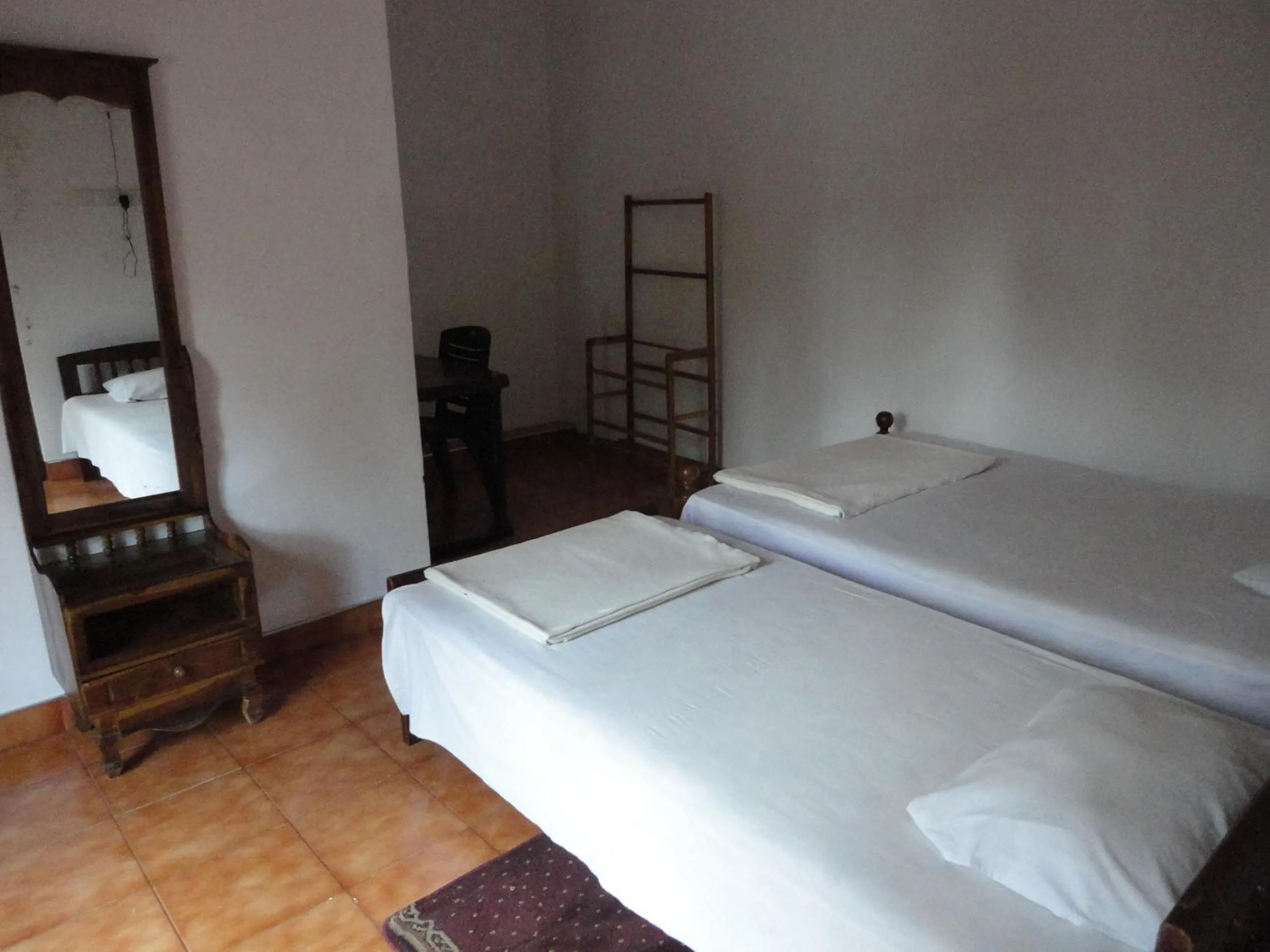 Bed in White Elephant Hotel