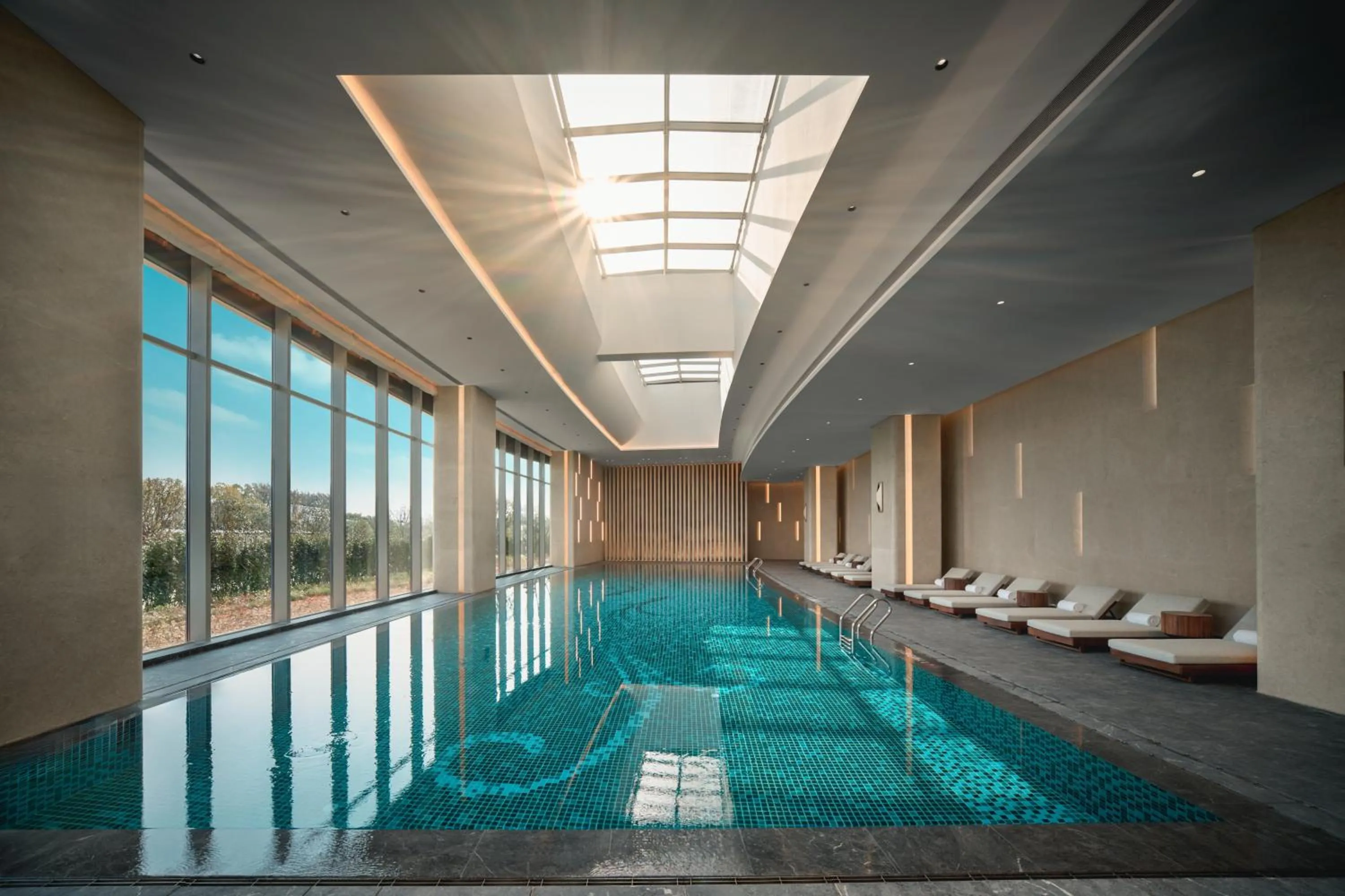 Swimming pool in Crowne Plaza Wuhan Tianhe Airport by IHG