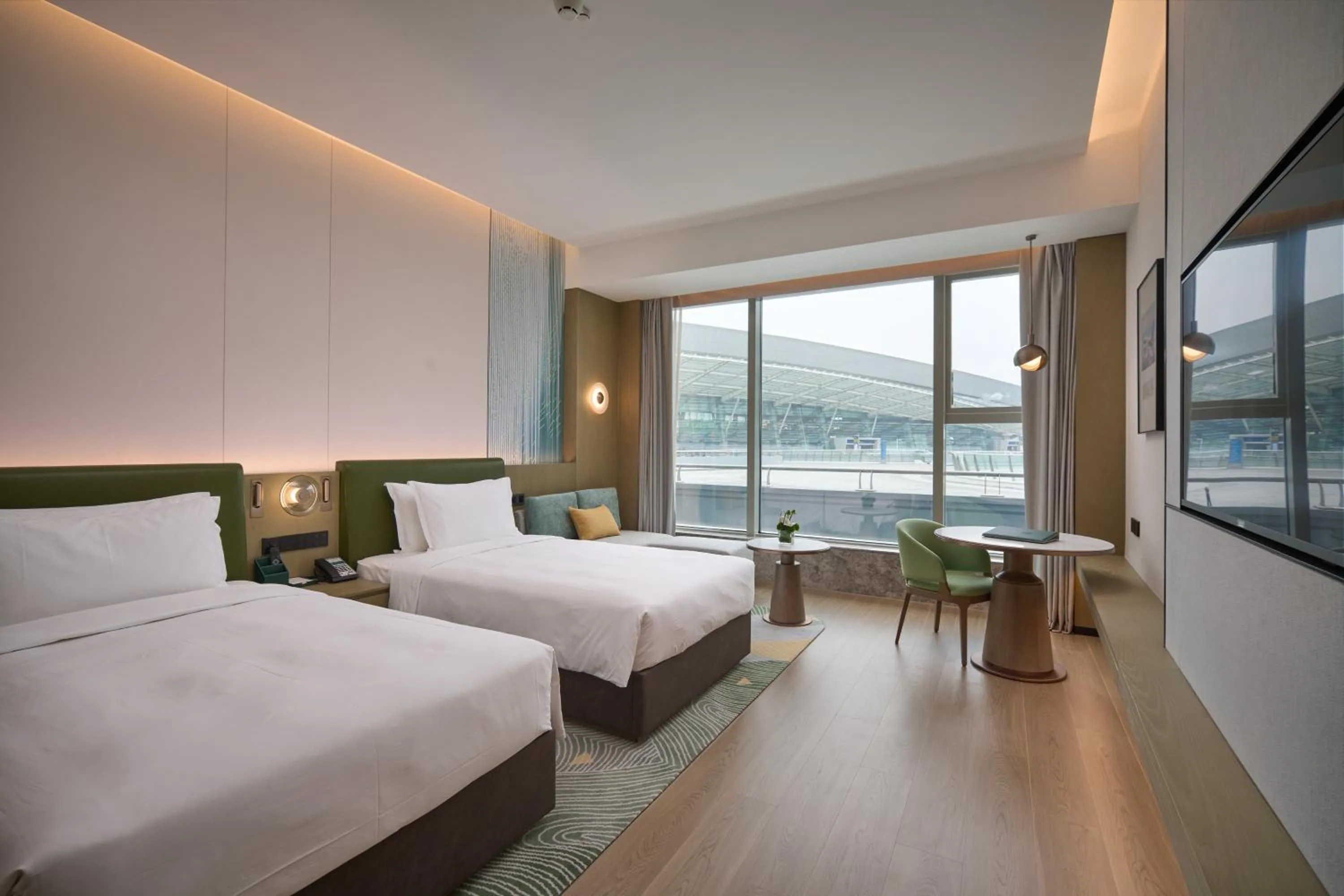 Bed in Holiday Inn Wuhan Tianhe Airport by IHG