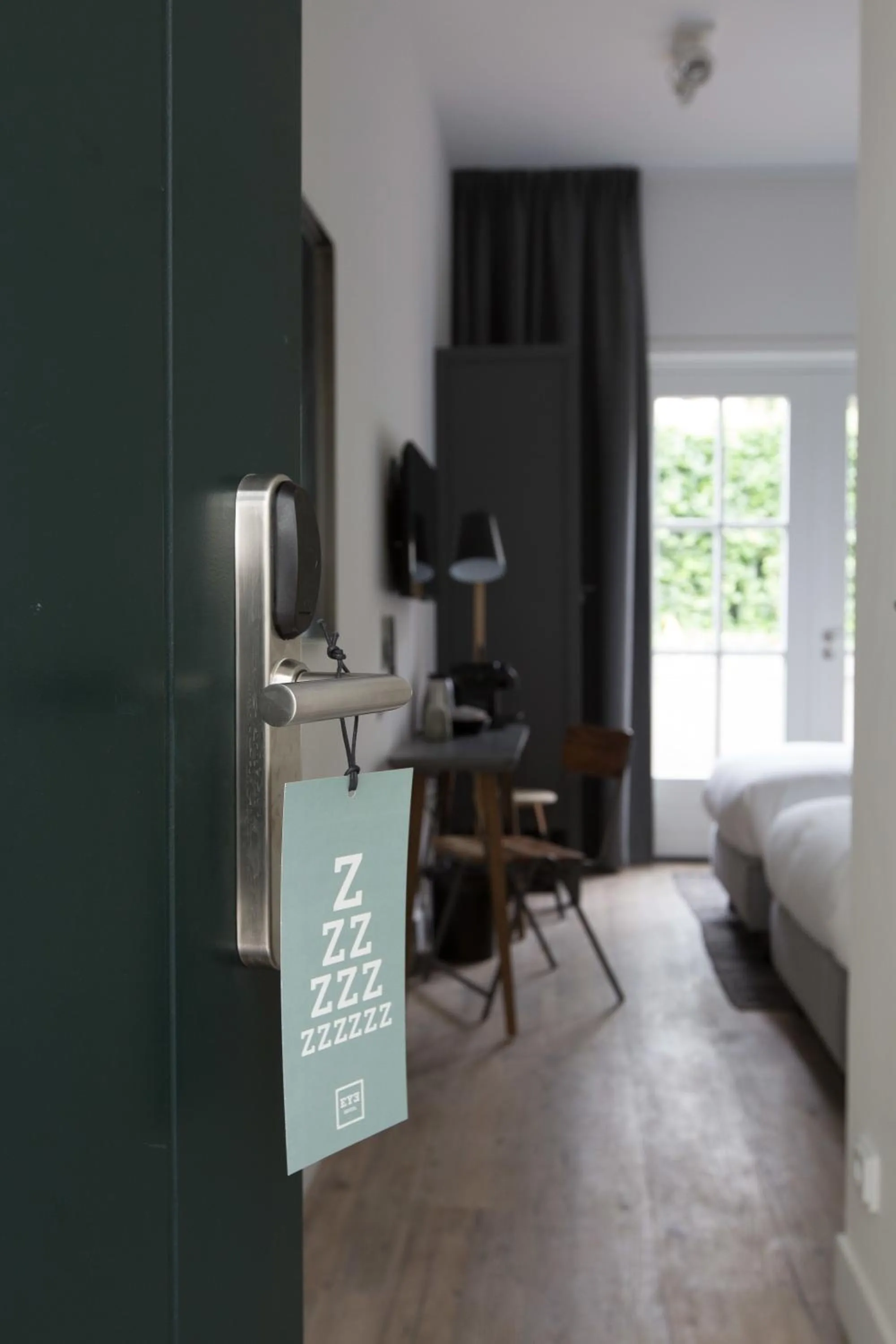 Photo of the whole room, Bed in Eye Hotel