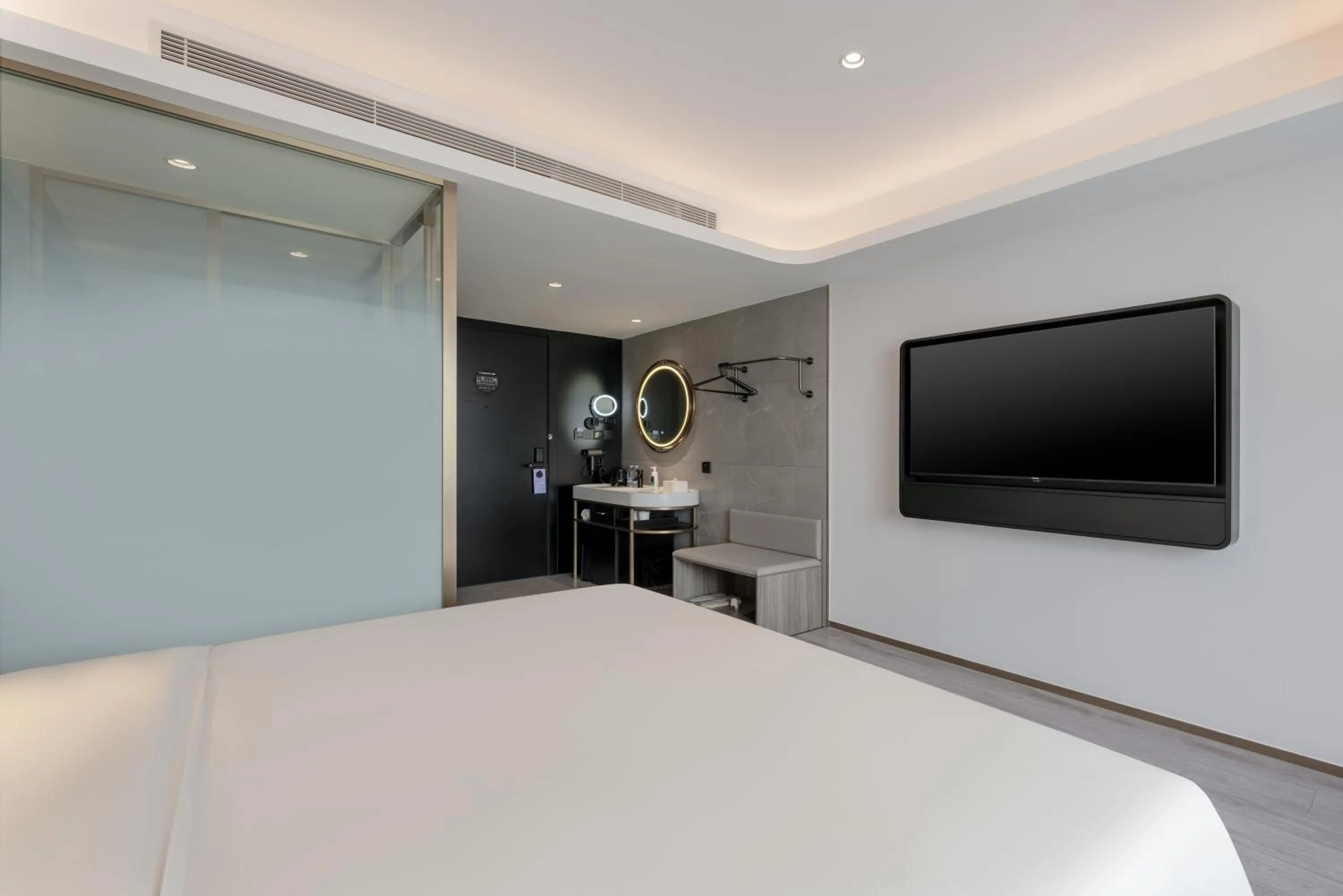 Bed in Atour Light Hotel Dalian Xinghai Square Hang Lung Shopping Center