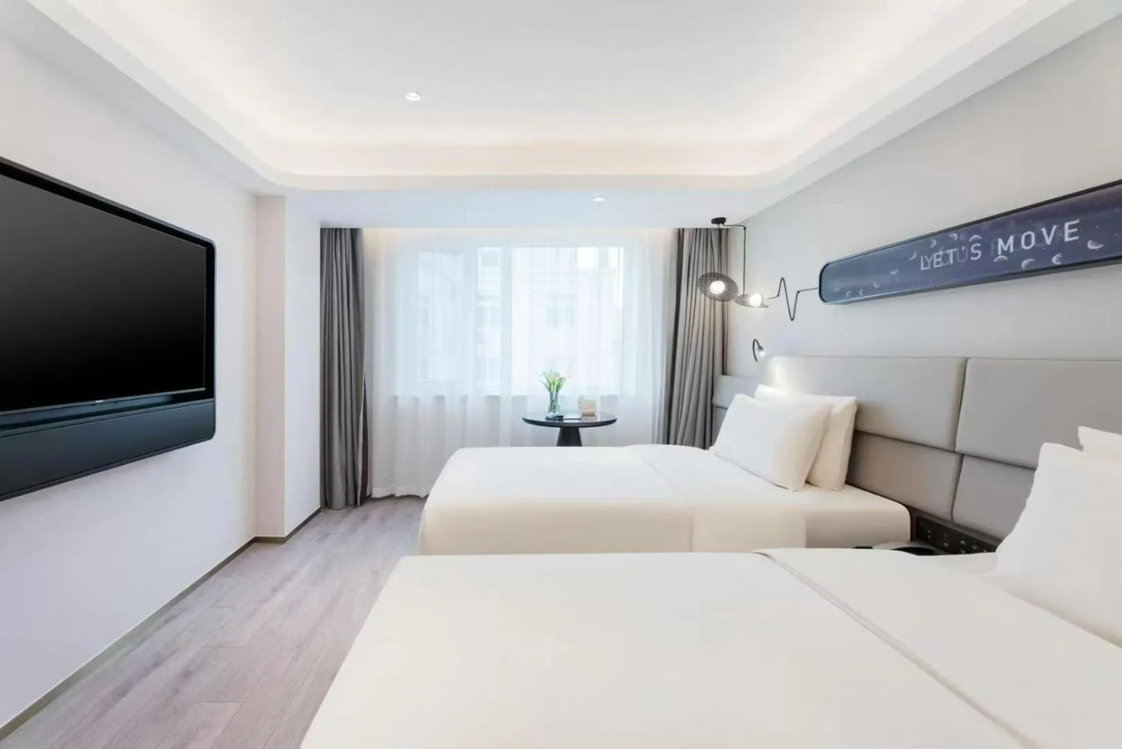 Bed in Atour Light Hotel Dalian Xinghai Square Hang Lung Shopping Center