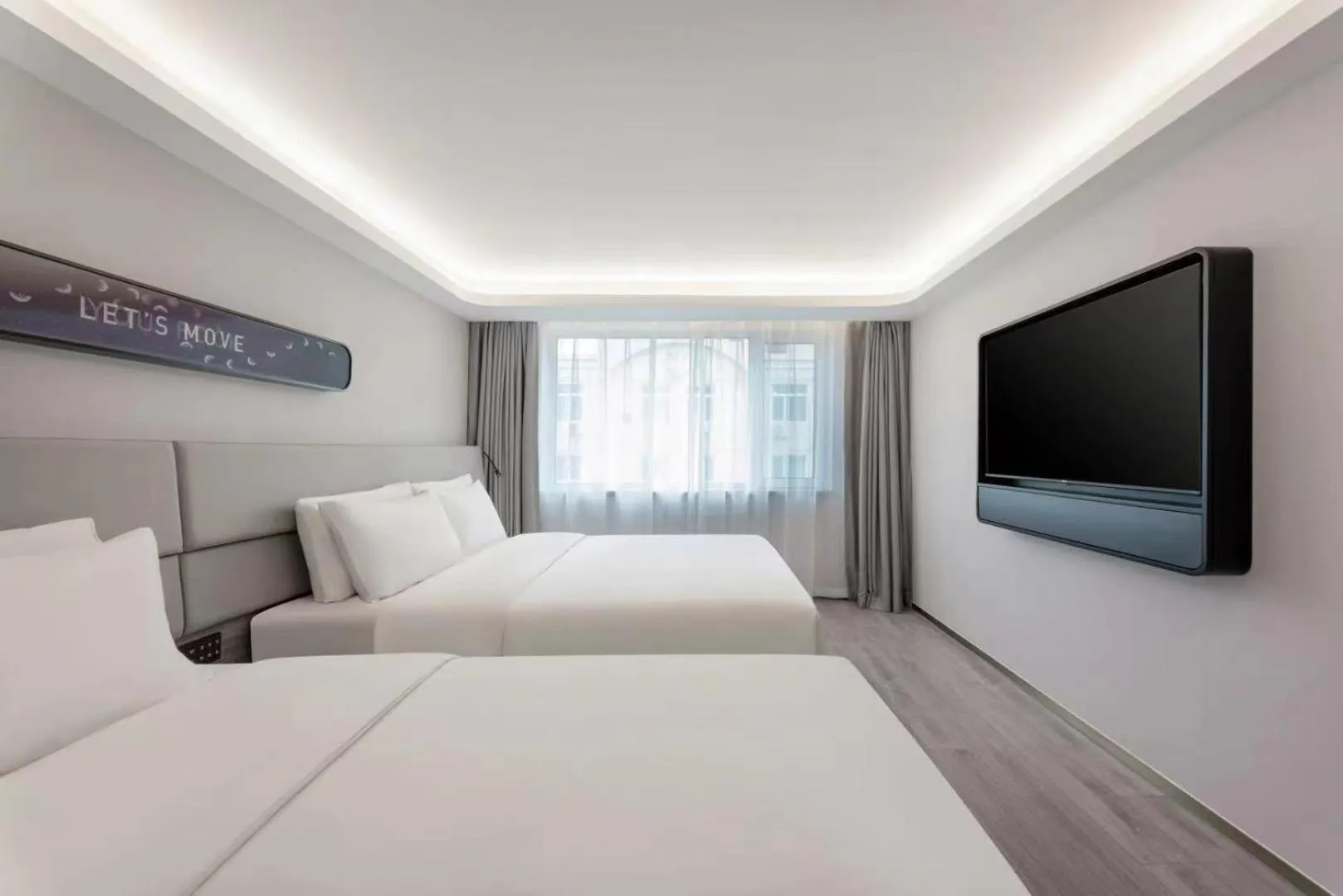 Bed in Atour Light Hotel Dalian Xinghai Square Hang Lung Shopping Center