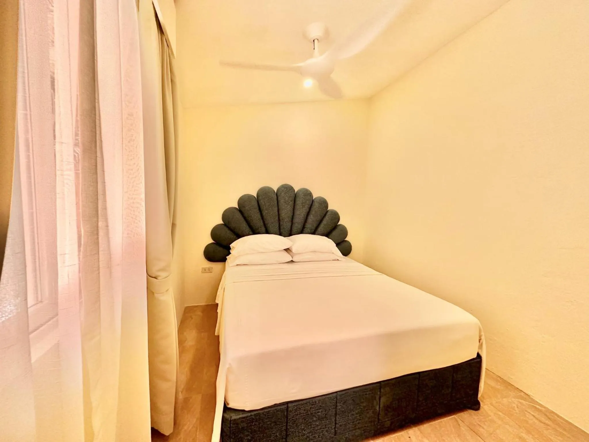 Bed in Coco Sunset Beach Resort