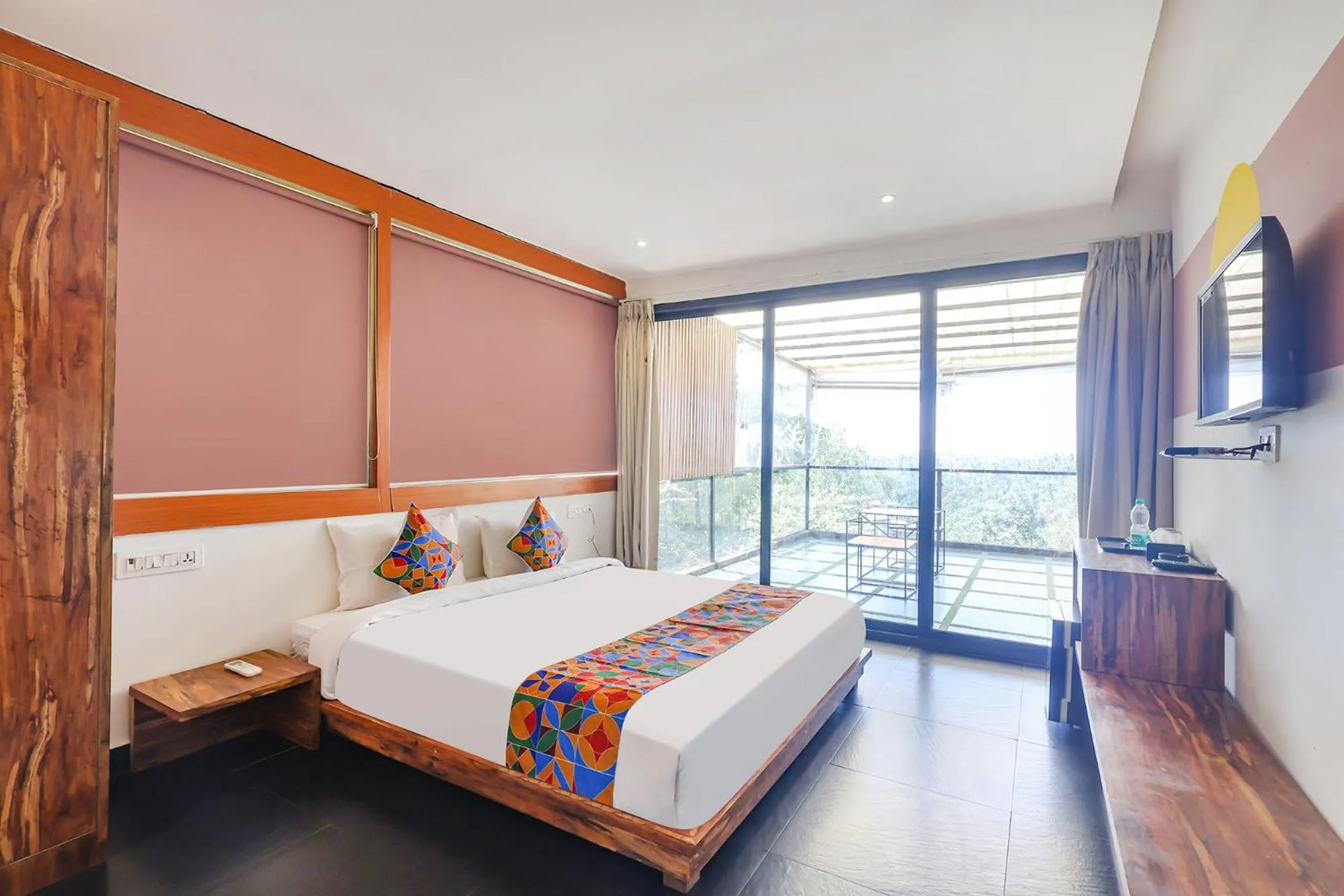 Bed in FabHotel Hillora Coastal Resort