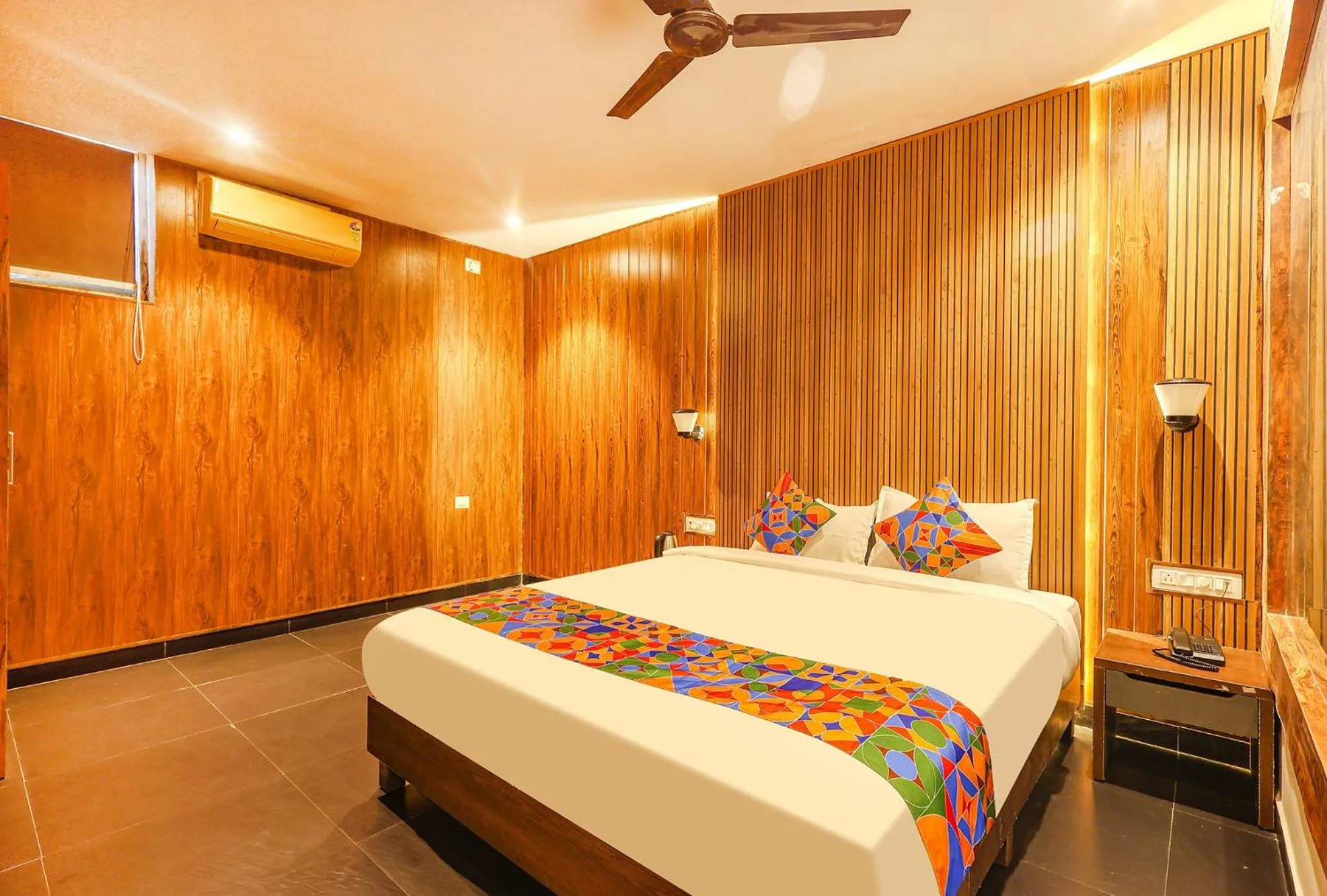 Bed in FabHotel Hillora Coastal Resort