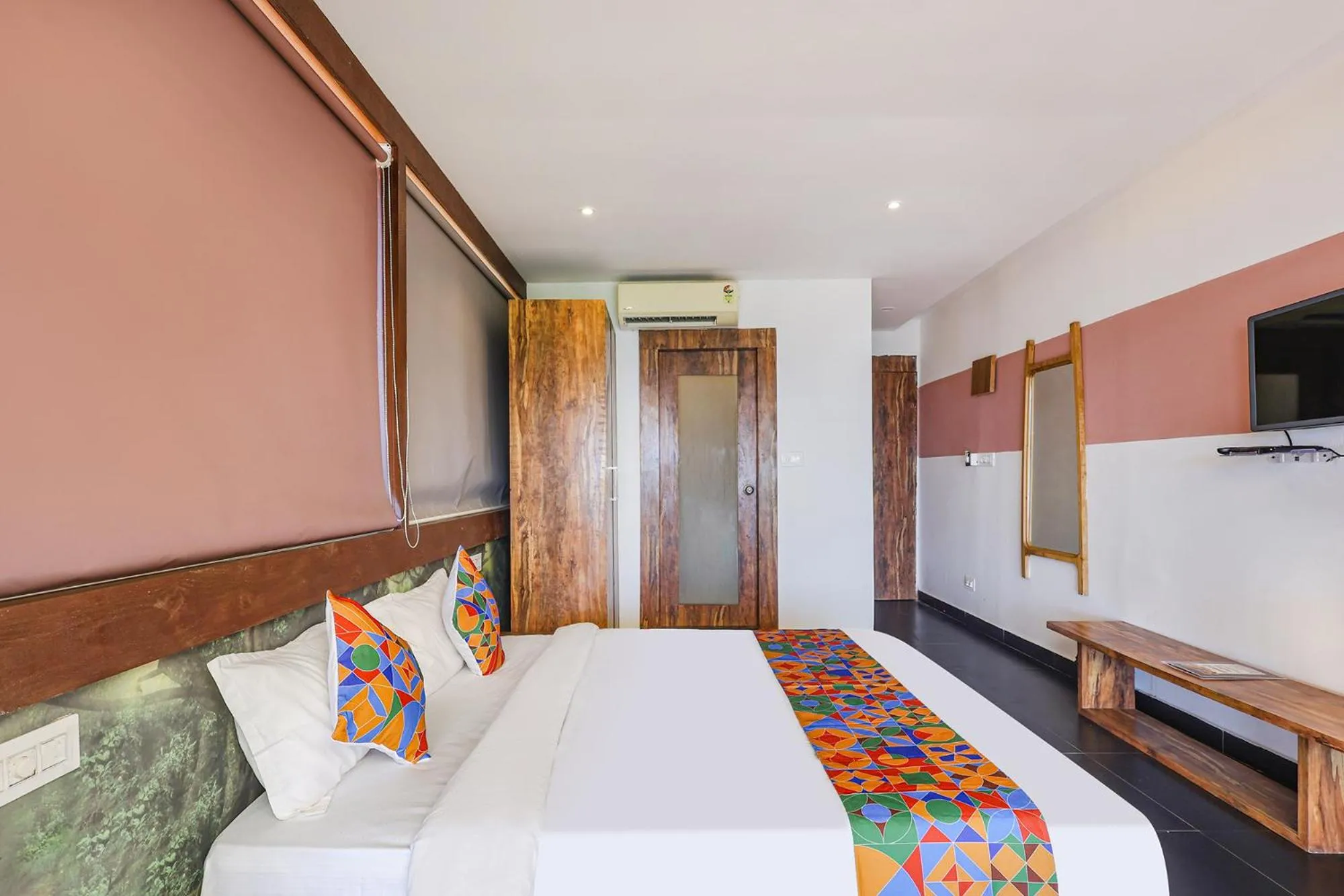 Bed in FabHotel Hillora Coastal Resort