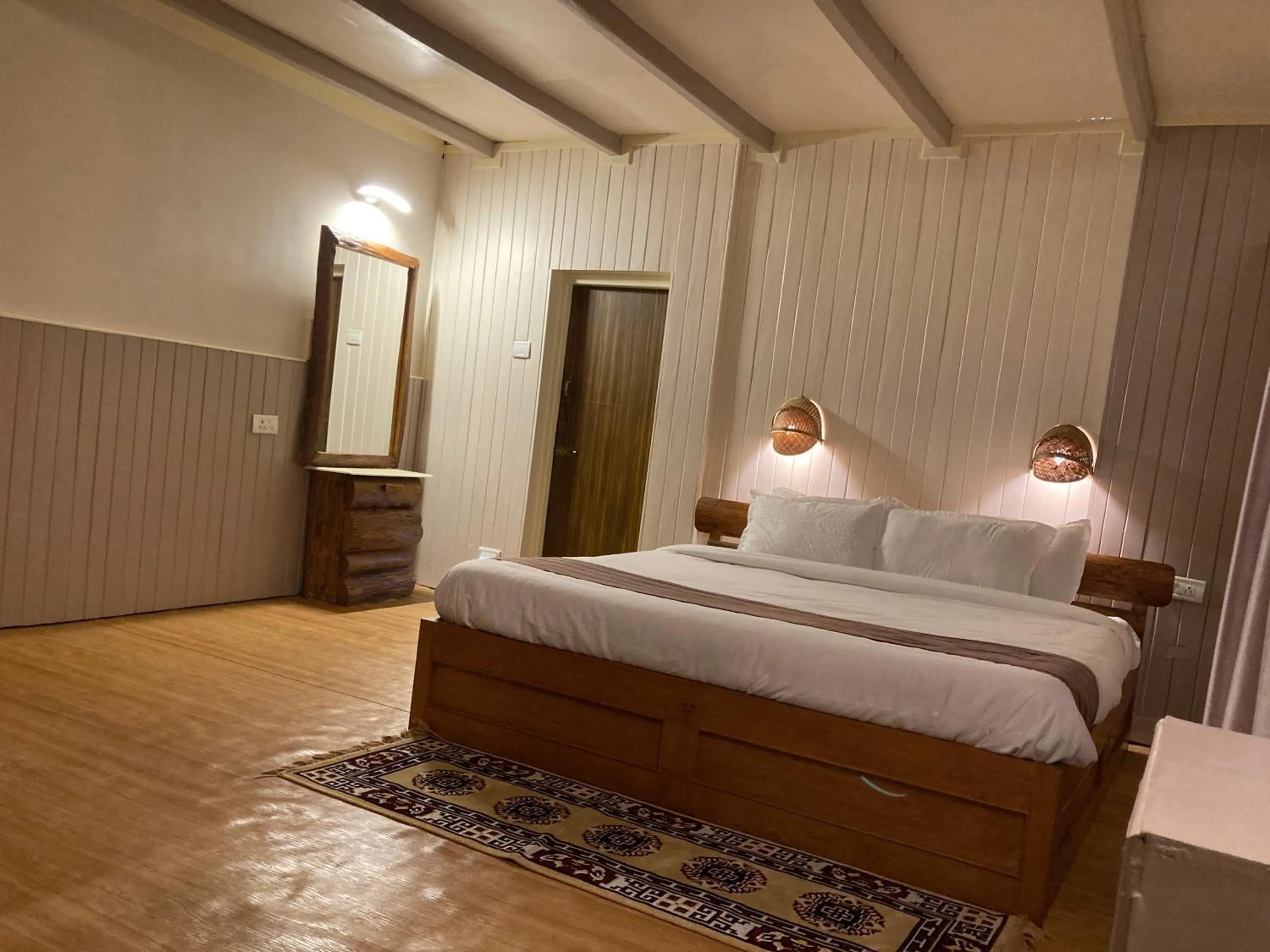 Bed in MayaTels - Maya Eco Huts, Pelling