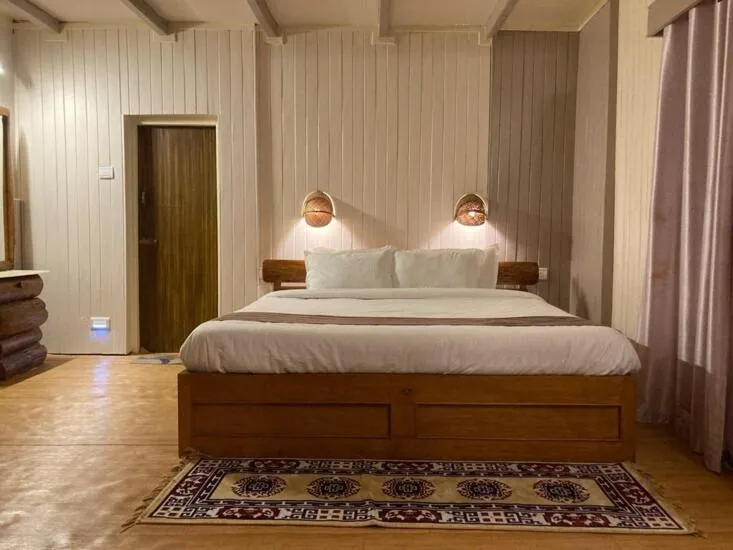 Bed in MayaTels - Maya Eco Huts, Pelling