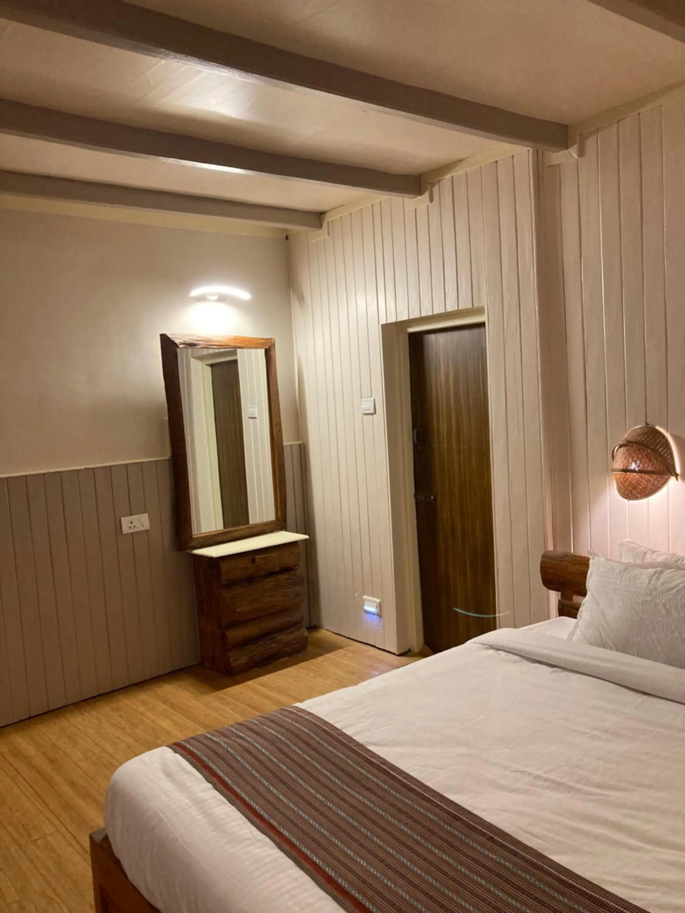 Bed in MayaTels - Maya Eco Huts, Pelling